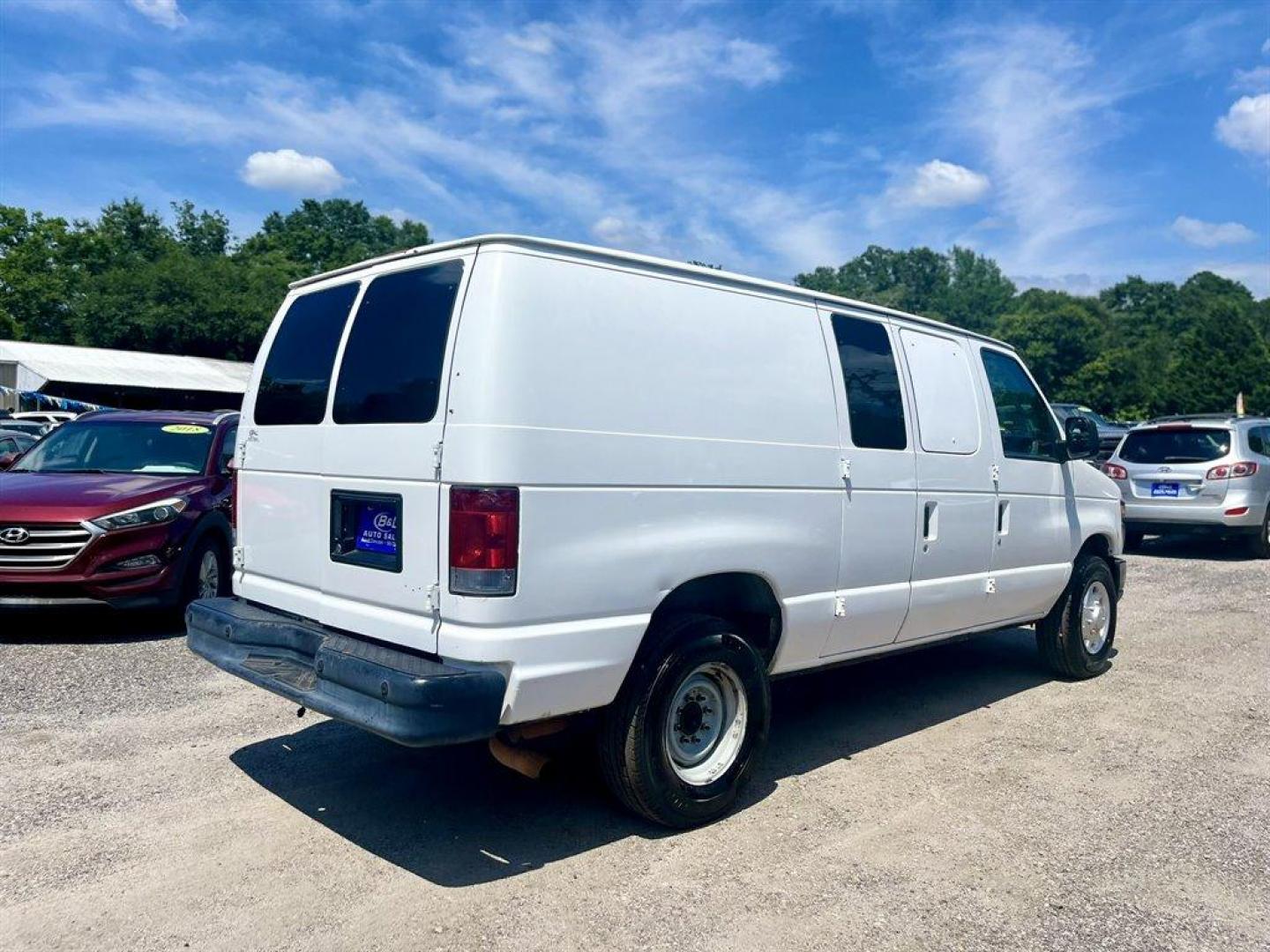 2011 White /Grey Ford E250 Vans (1FTNE2EL4BD) with an 5.4l V8 EFI Sohc 5.4l engine, Automatic transmission, located at 745 East Steele Rd., West Columbia, SC, 29170, (803) 755-9148, 33.927212, -81.148483 - Photo#2