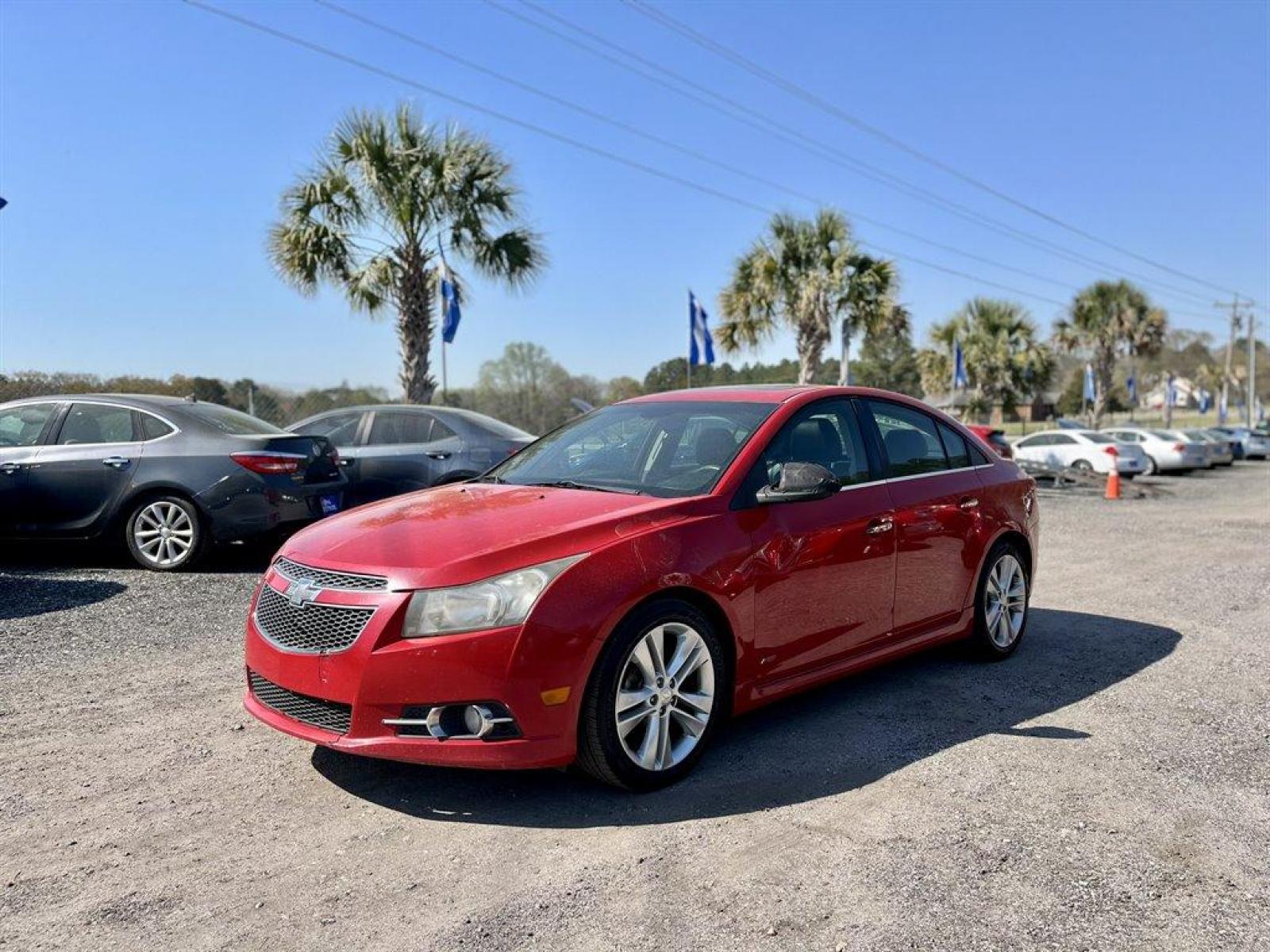 2012 Red /Black Chevrolet Cruze (1G1PH5SC0C7) with an 1.4l I-4 MFI Dohc T/C 1.4 engine, Automatic transmission, located at 745 East Steele Rd., West Columbia, SC, 29170, (803) 755-9148, 33.927212, -81.148483 - Special Internet Price! 2012 Chevrolet Cruze LTZ with AM/FM stereo, Cruise control, Sunroof, Air conditioning, Remote Keyless Entry, Leather interior, Heated front seats, Powered driver seat, Powered windows, Powered door locks, Plus more! - Photo #0
