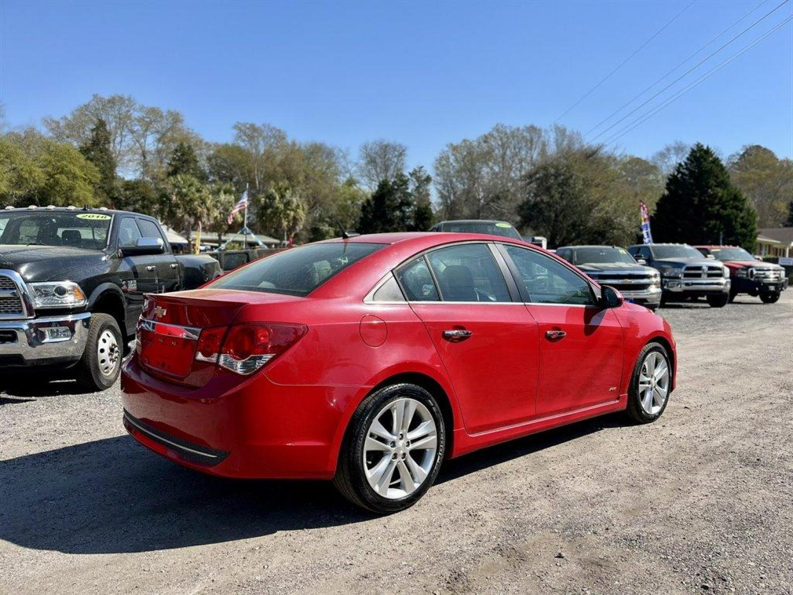 2012 Red /Black Chevrolet Cruze (1G1PH5SC0C7) with an 1.4l I-4 MFI Dohc T/C 1.4 engine, Automatic transmission, located at 745 East Steele Rd., West Columbia, SC, 29170, (803) 755-9148, 33.927212, -81.148483 - Special Internet Price! 2012 Chevrolet Cruze LTZ with AM/FM stereo, Cruise control, Sunroof, Air conditioning, Remote Keyless Entry, Leather interior, Heated front seats, Powered driver seat, Powered windows, Powered door locks, Plus more! - Photo #2