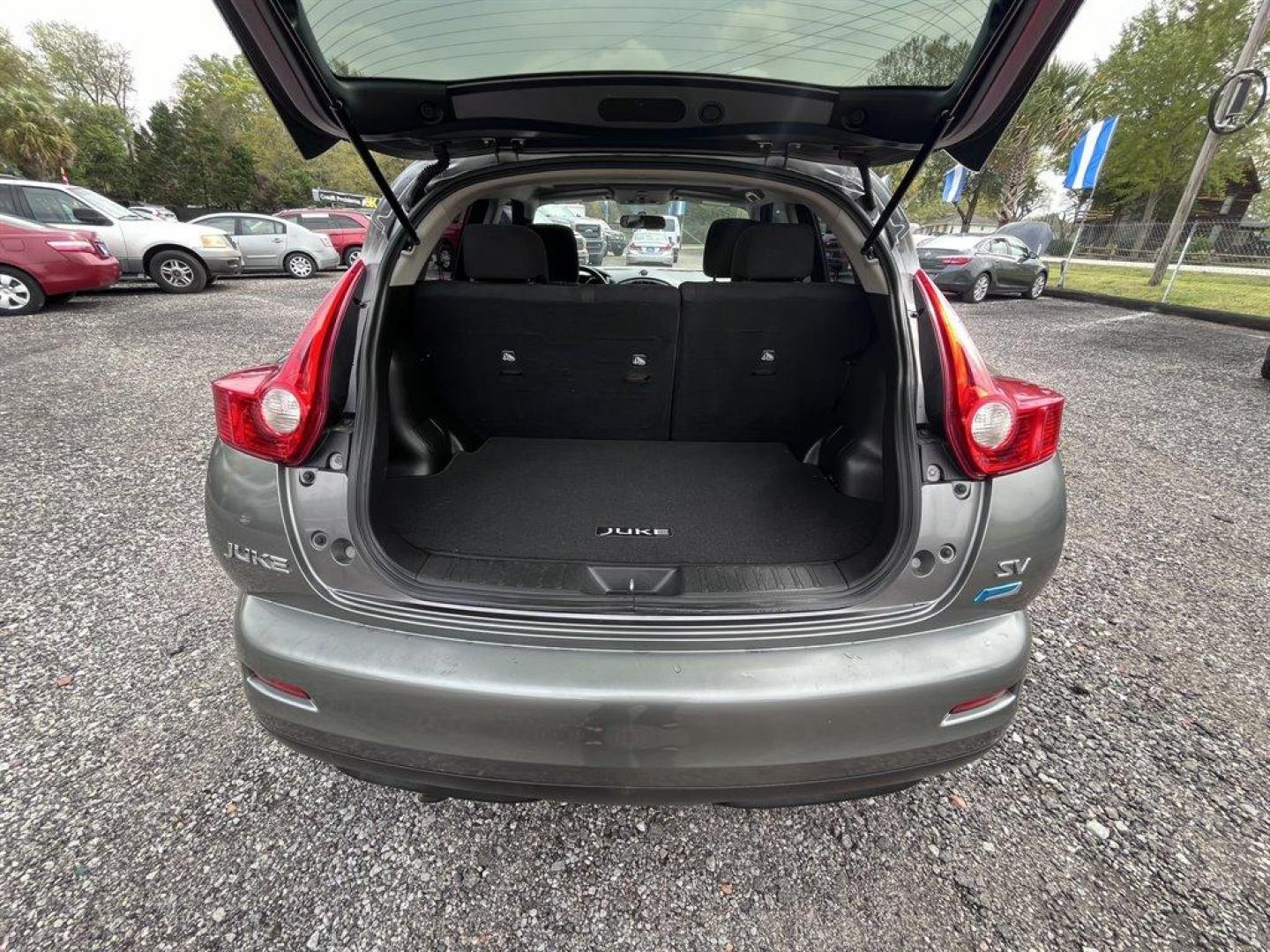 2014 Grey /Black Nissan Juke (JN8AF5MR0ET) with an 1.6l I-4 DI Dohc T/C 1.6l engine, Automatic transmission, located at 745 East Steele Rd., West Columbia, SC, 29170, (803) 755-9148, 33.927212, -81.148483 - Special Internet Price! 2014 Nissan Juke SV with Bluetooth, AM/FM/CD/MP3 Audio System, Remote Keyless Entry, Cruise Control, Sunroof, Automatic Air Conditioning, Rear 60-40 Folding Bench, Powered Windows, Powered Door Locks, Plus more! - Photo#24