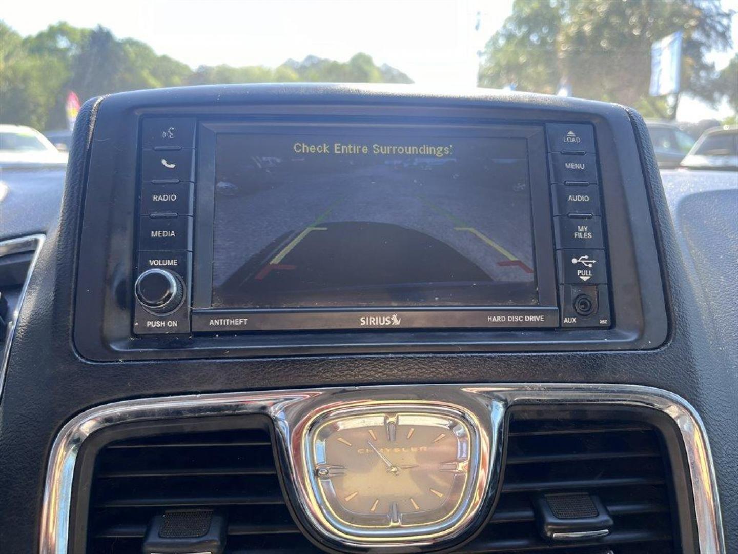 2016 Gold /Black Chrysler Town and Country (2C4RC1BGXGR) with an 3.6l V6 MPI Dohc VVT Flex engine, Automatic transmission, located at 745 East Steele Rd., West Columbia, SC, 29170, (803) 755-9148, 33.927212, -81.148483 - Special Internet Price! 2016 Chrysler Town and Country Touring with Bluetooth, Backup camera, Cruise control, Air conditioning, Leather interior, Rear entertainment, 3rd row seating, Powered sliding rear doors, Powered liftgate, Powered driver seat, Powered windows, Powered door locks, Plus more! - Photo#12