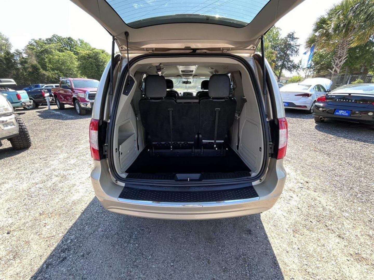 2016 Gold /Black Chrysler Town and Country (2C4RC1BGXGR) with an 3.6l V6 MPI Dohc VVT Flex engine, Automatic transmission, located at 745 East Steele Rd., West Columbia, SC, 29170, (803) 755-9148, 33.927212, -81.148483 - Special Internet Price! 2016 Chrysler Town and Country Touring with Bluetooth, Backup camera, Cruise control, Air conditioning, Leather interior, Rear entertainment, 3rd row seating, Powered sliding rear doors, Powered liftgate, Powered driver seat, Powered windows, Powered door locks, Plus more! - Photo#27