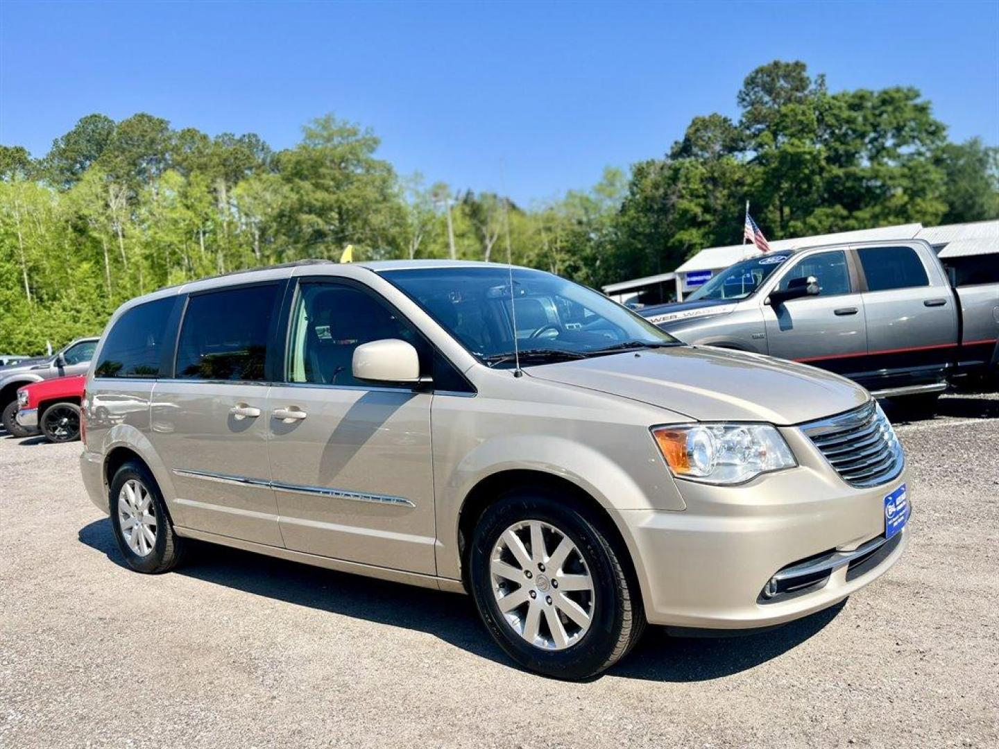 2016 Gold /Black Chrysler Town and Country (2C4RC1BGXGR) with an 3.6l V6 MPI Dohc VVT Flex engine, Automatic transmission, located at 745 East Steele Rd., West Columbia, SC, 29170, (803) 755-9148, 33.927212, -81.148483 - Special Internet Price! 2016 Chrysler Town and Country Touring with Bluetooth, Backup camera, Cruise control, Air conditioning, Leather interior, Rear entertainment, 3rd row seating, Powered sliding rear doors, Powered liftgate, Powered driver seat, Powered windows, Powered door locks, Plus more! - Photo#3