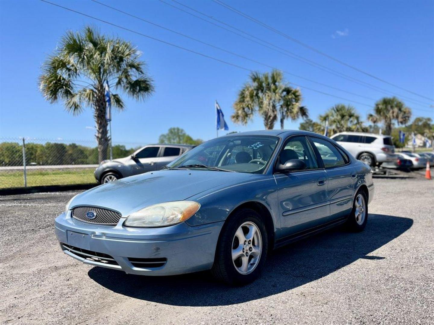 2007 Blue /Tan Ford Taurus (1FAFP53U57A) with an 3.0l V6 SFI 3.0l engine, Automatic transmission, located at 745 East Steele Rd., West Columbia, SC, 29170, (803) 755-9148, 33.927212, -81.148483 - CASH CAR! AS IS! AS IS! AS IS! - Photo#0