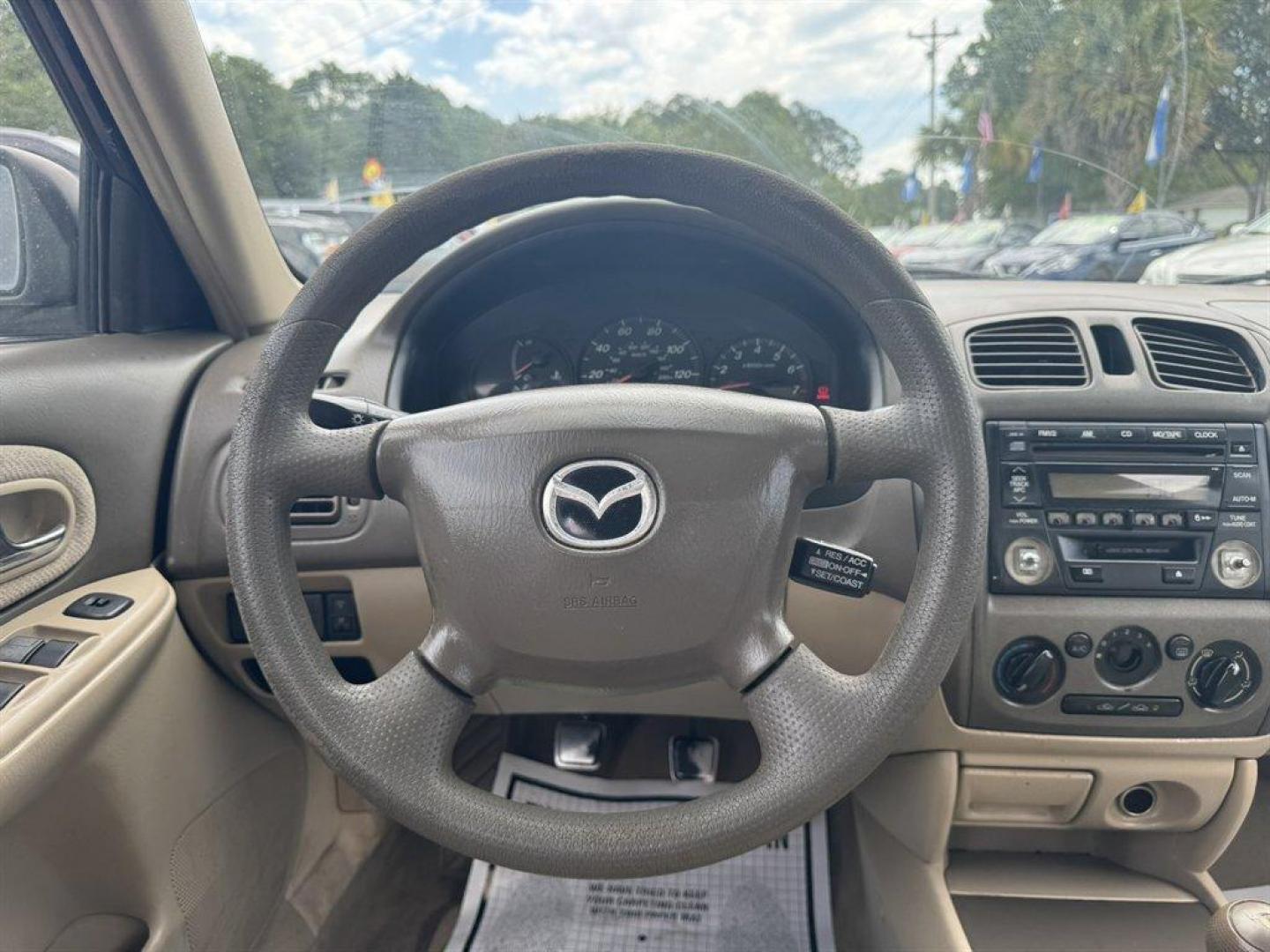 2001 Gold /Tan Mazda Protege (JM1BJ222210) with an 1.6l I-4 MPI Dohc 1.6l engine, Manual transmission, located at 745 East Steele Rd., West Columbia, SC, 29170, (803) 755-9148, 33.927212, -81.148483 - Special Internet Price! 2001 Mazda Protege - Photo#7