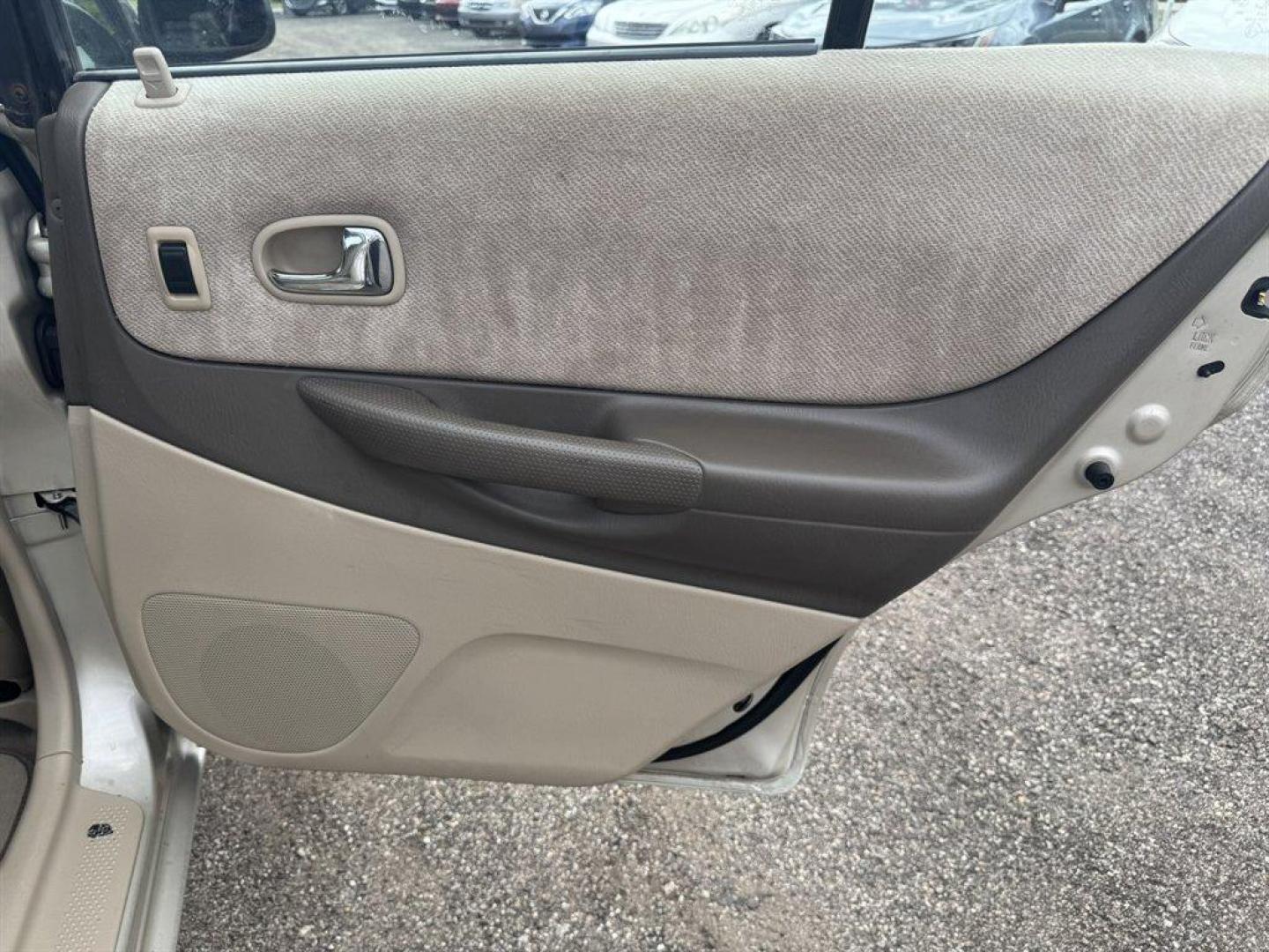 2001 Gold /Tan Mazda Protege (JM1BJ222210) with an 1.6l I-4 MPI Dohc 1.6l engine, Manual transmission, located at 745 East Steele Rd., West Columbia, SC, 29170, (803) 755-9148, 33.927212, -81.148483 - Special Internet Price! 2001 Mazda Protege - Photo#21