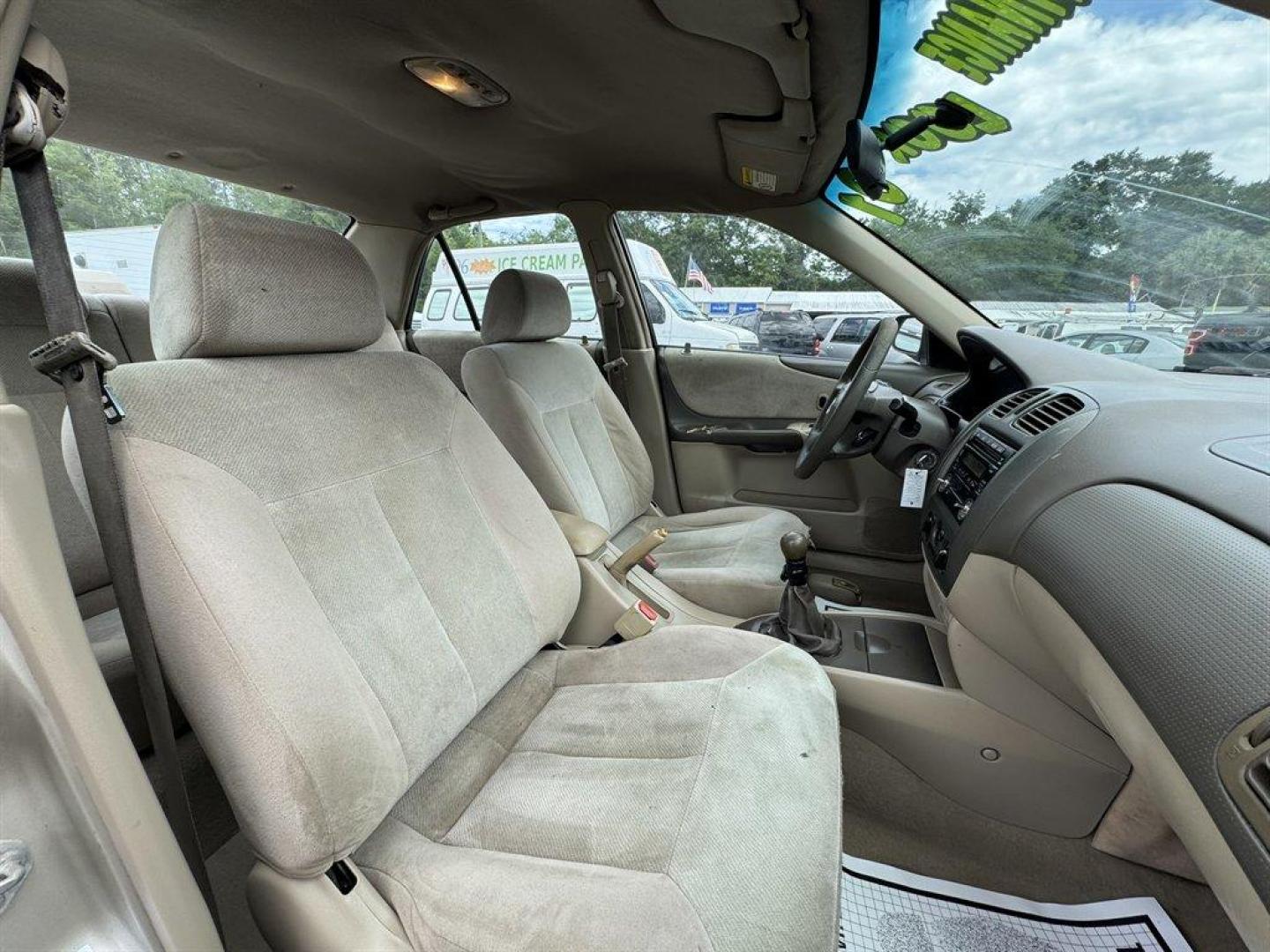 2001 Gold /Tan Mazda Protege (JM1BJ222210) with an 1.6l I-4 MPI Dohc 1.6l engine, Manual transmission, located at 745 East Steele Rd., West Columbia, SC, 29170, (803) 755-9148, 33.927212, -81.148483 - Special Internet Price! 2001 Mazda Protege - Photo#25