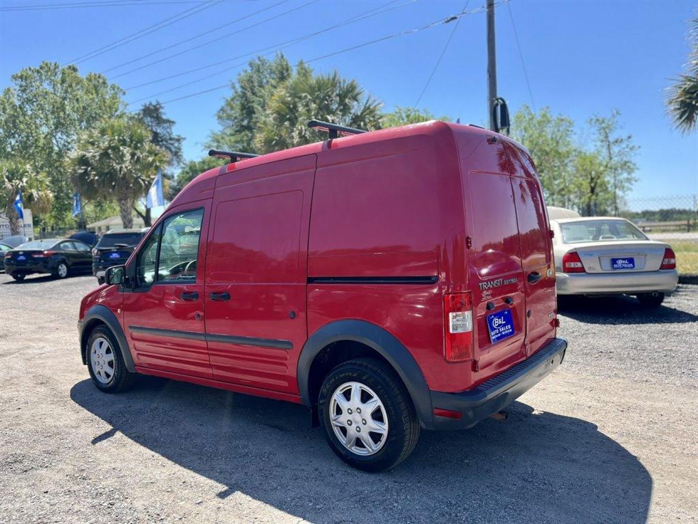 2012 Red /Grey Ford Transit Connect (NM0LS7AN3CT) with an 2.0l I-4 Smpi Dohc 2.0l engine, Automatic transmission, located at 745 East Steele Rd., West Columbia, SC, 29170, (803) 755-9148, 33.927212, -81.148483 - Special Internet Price! 2012 Ford Transit Connect XL - Photo#1