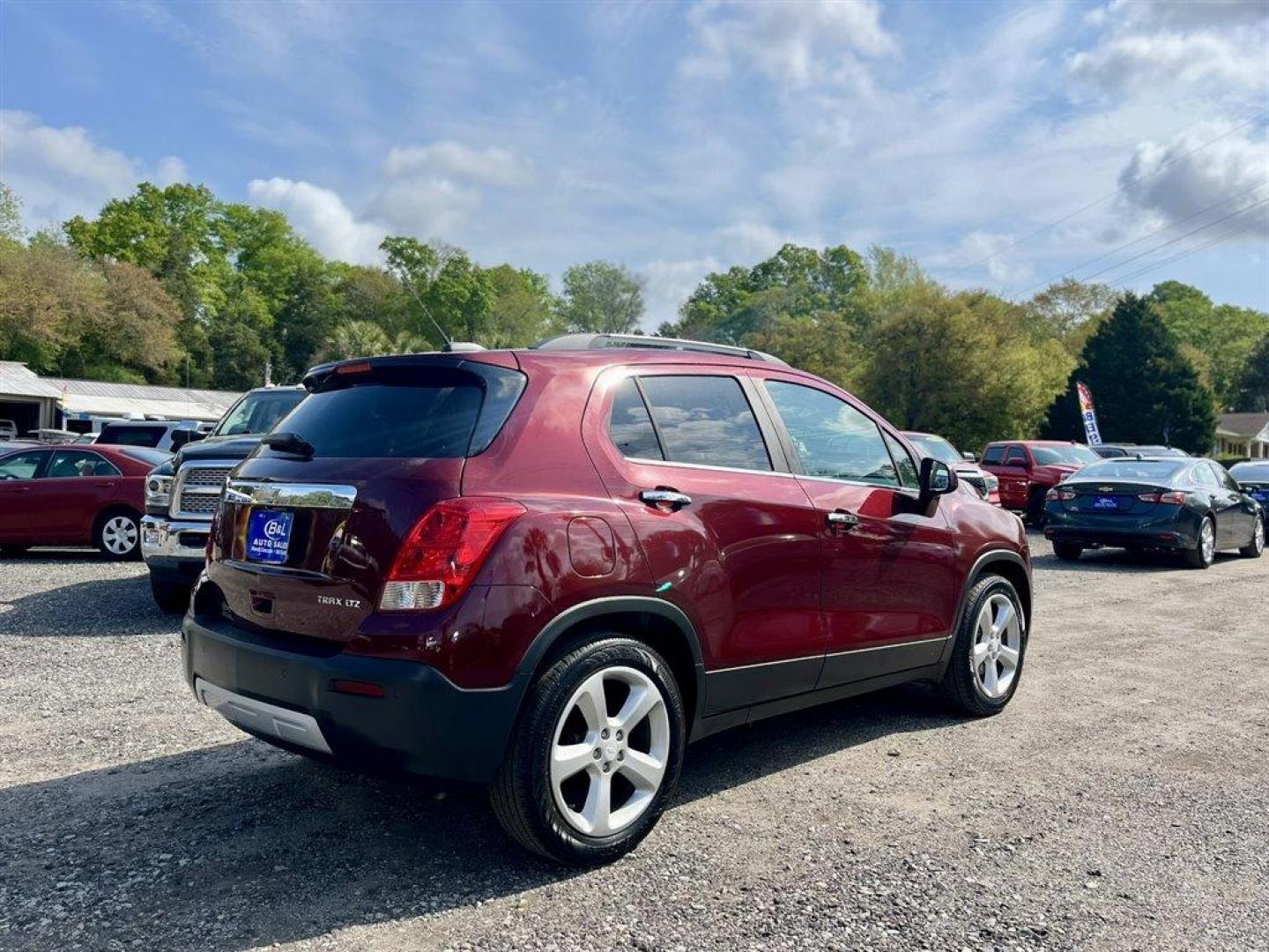 2016 Red /Black Chevrolet Trax (3GNCJMSB7GL) with an 1.4l I-4 MFI Dohc T/C 1.4 engine, Automatic transmission, located at 745 East Steele Rd., West Columbia, SC, 29170, (803) 755-9148, 33.927212, -81.148483 - Special Internet Price! 2016 Chevrolet Trax with Chevrolet MyLink radio, 7 diagonal color touch-screen, AM/FM stereo, Backup camera, Cruise control, Air conditioning, Remote vehicle starter system, Remote Keyless Entry, Leather interior, Powered driver seat, Powered windows, Powered door locks, Plus - Photo#2