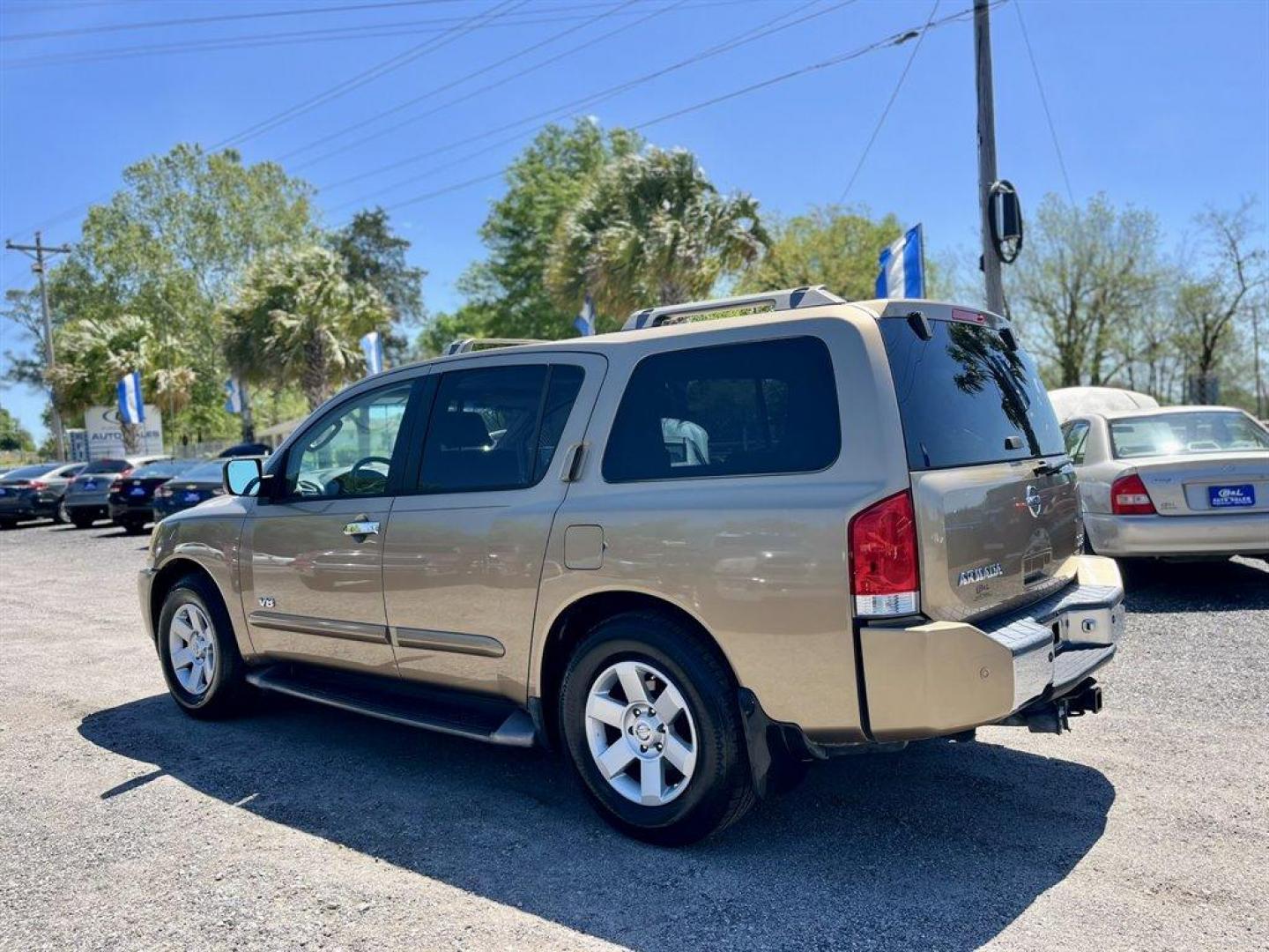 2005 Gold /Black Nissan Armada (5N1AA08A45N) with an 5.6l V8 MPI Dohc 5.6l engine, Automatic transmission, located at 745 East Steele Rd., West Columbia, SC, 29170, (803) 755-9148, 33.927212, -81.148483 - Special Internet Price! 2005 Nissan Armada LE with AM/FM radio, Air conditioning, Cruise control, Keyless entry, Leather interior, 3rd row seating, Rear entertainment, Powered liftgate, Powered windows, Powered door locks, Plus more! - Photo#1