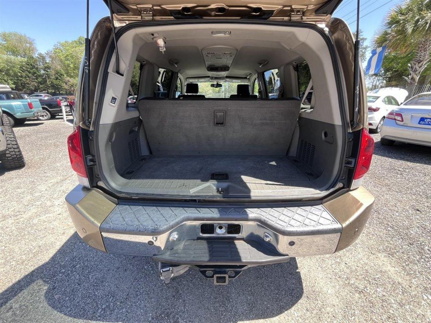 2005 Gold /Black Nissan Armada (5N1AA08A45N) with an 5.6l V8 MPI Dohc 5.6l engine, Automatic transmission, located at 745 East Steele Rd., West Columbia, SC, 29170, (803) 755-9148, 33.927212, -81.148483 - Special Internet Price! 2005 Nissan Armada LE with AM/FM radio, Air conditioning, Cruise control, Keyless entry, Leather interior, 3rd row seating, Rear entertainment, Powered liftgate, Powered windows, Powered door locks, Plus more! - Photo#34