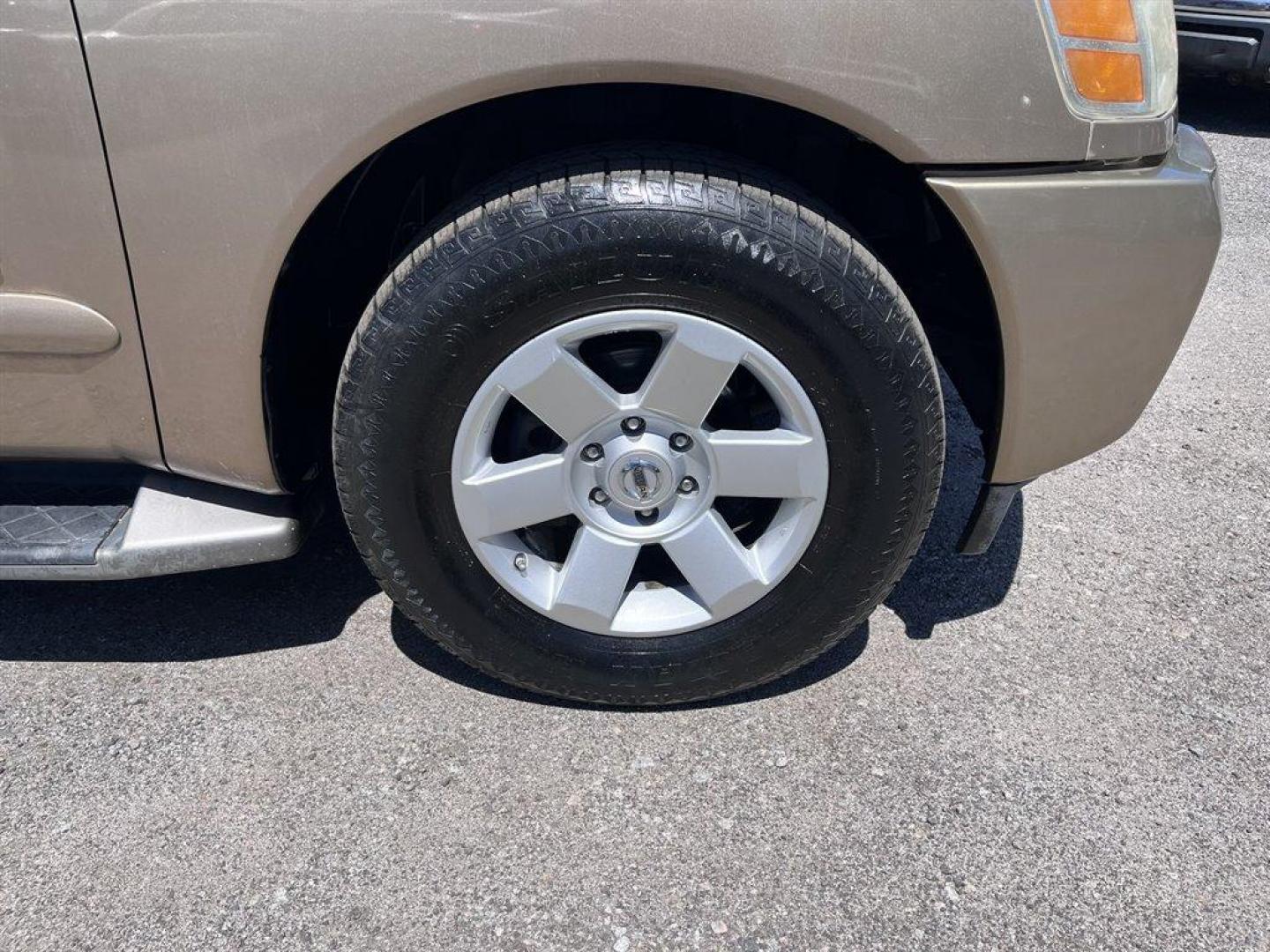 2005 Gold /Black Nissan Armada (5N1AA08A45N) with an 5.6l V8 MPI Dohc 5.6l engine, Automatic transmission, located at 745 East Steele Rd., West Columbia, SC, 29170, (803) 755-9148, 33.927212, -81.148483 - Special Internet Price! 2005 Nissan Armada LE with AM/FM radio, Air conditioning, Cruise control, Keyless entry, Leather interior, 3rd row seating, Rear entertainment, Powered liftgate, Powered windows, Powered door locks, Plus more! - Photo#36