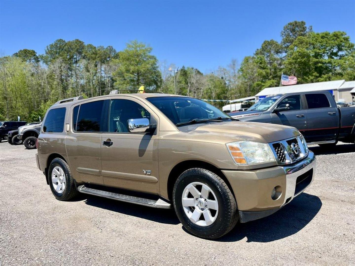 2005 Gold /Black Nissan Armada (5N1AA08A45N) with an 5.6l V8 MPI Dohc 5.6l engine, Automatic transmission, located at 745 East Steele Rd., West Columbia, SC, 29170, (803) 755-9148, 33.927212, -81.148483 - Special Internet Price! 2005 Nissan Armada LE with AM/FM radio, Air conditioning, Cruise control, Keyless entry, Leather interior, 3rd row seating, Rear entertainment, Powered liftgate, Powered windows, Powered door locks, Plus more! - Photo#3