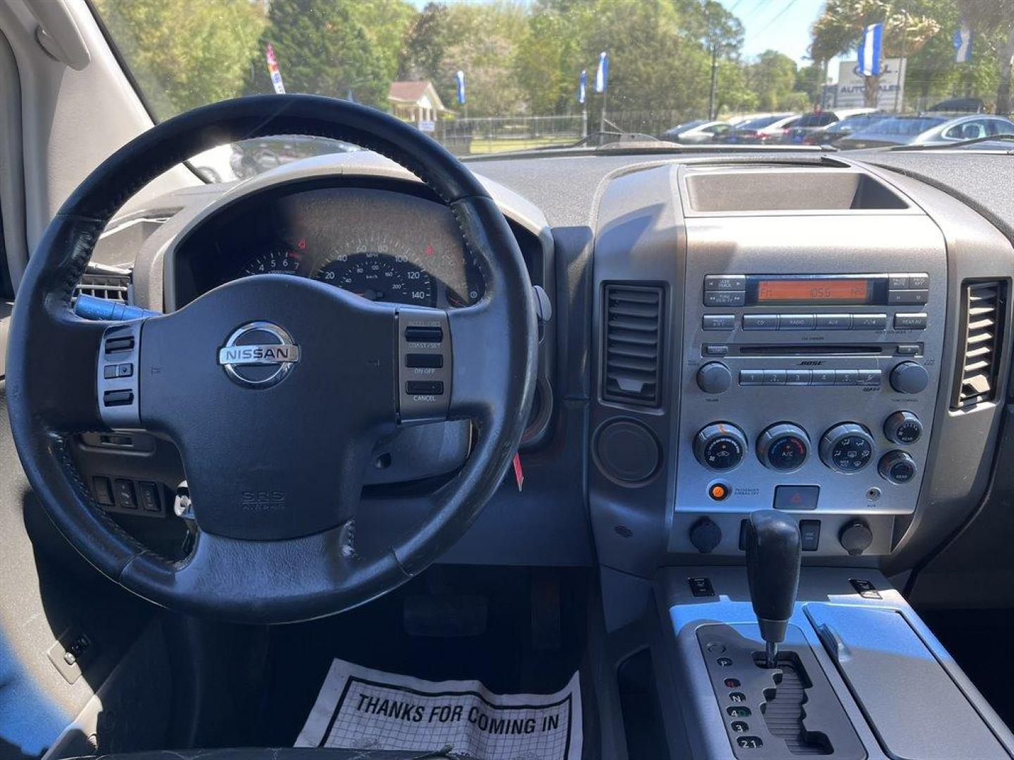 2005 Gold /Black Nissan Armada (5N1AA08A45N) with an 5.6l V8 MPI Dohc 5.6l engine, Automatic transmission, located at 745 East Steele Rd., West Columbia, SC, 29170, (803) 755-9148, 33.927212, -81.148483 - Special Internet Price! 2005 Nissan Armada LE with AM/FM radio, Air conditioning, Cruise control, Keyless entry, Leather interior, 3rd row seating, Rear entertainment, Powered liftgate, Powered windows, Powered door locks, Plus more! - Photo#4