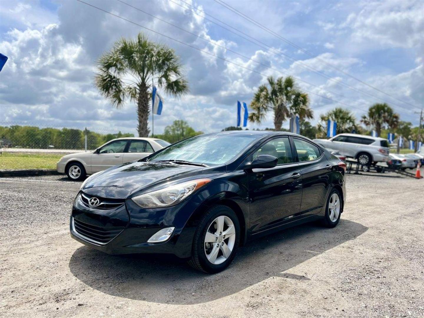 2013 Black /Tan Hyundai Elantra (KMHDH4AE8DU) with an 1.8l I-4 MPI Dohc 1.8l engine, Automatic transmission, located at 745 East Steele Rd., West Columbia, SC, 29170, (803) 755-9148, 33.927212, -81.148483 - Special Internet Price! 2013 Hyundai Elantra with Bluetooth, AM/FM/XM stereo, Remote keyless entry system, Cruise control, Cloth front bucket seats, Rear 60/40 split fold-down seat, Powered windows, Powered door locks, Plus more! - Photo#0