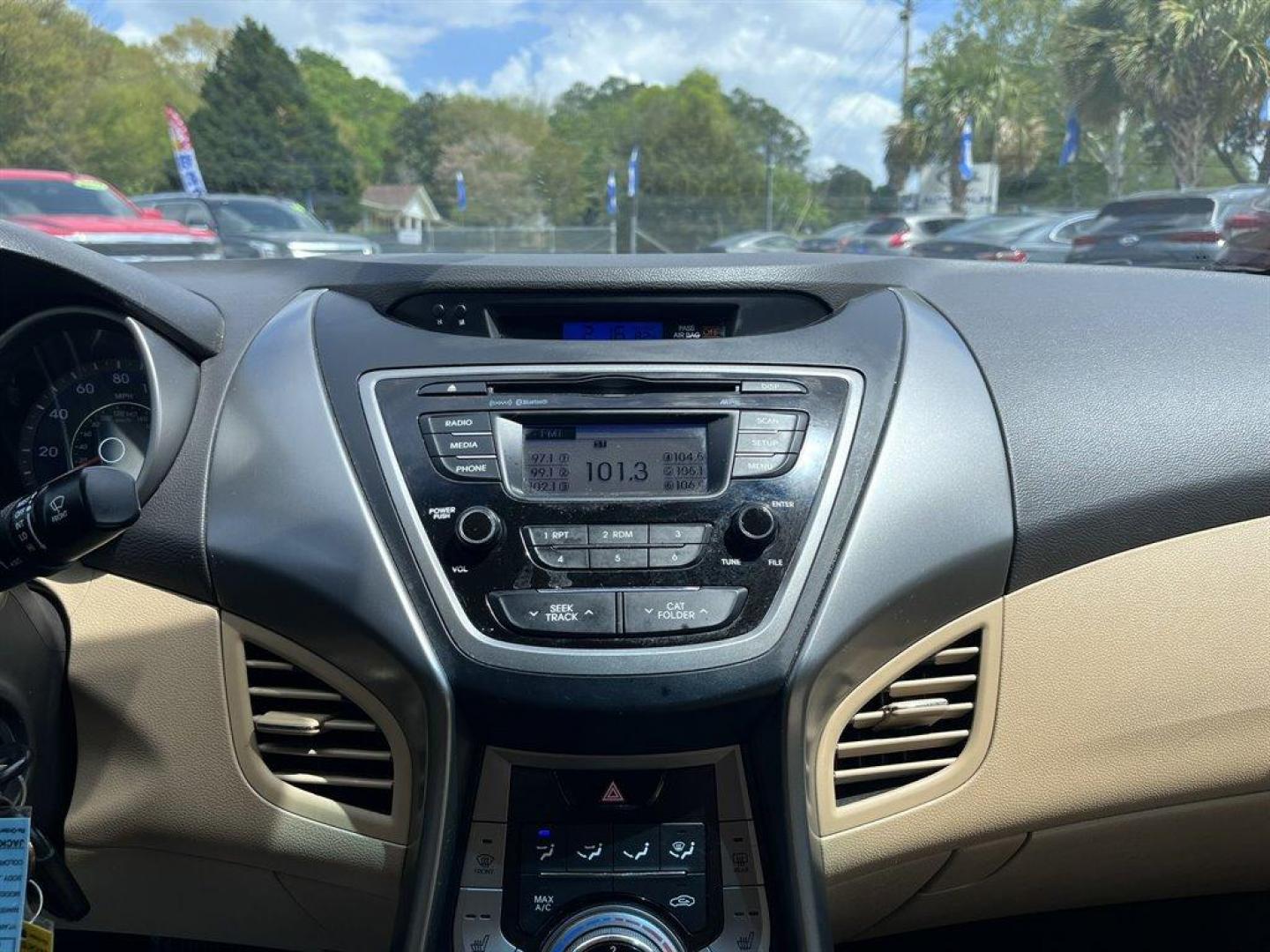 2013 Black /Tan Hyundai Elantra (KMHDH4AE8DU) with an 1.8l I-4 MPI Dohc 1.8l engine, Automatic transmission, located at 745 East Steele Rd., West Columbia, SC, 29170, (803) 755-9148, 33.927212, -81.148483 - Special Internet Price! 2013 Hyundai Elantra with Bluetooth, AM/FM/XM stereo, Remote keyless entry system, Cruise control, Cloth front bucket seats, Rear 60/40 split fold-down seat, Powered windows, Powered door locks, Plus more! - Photo#11