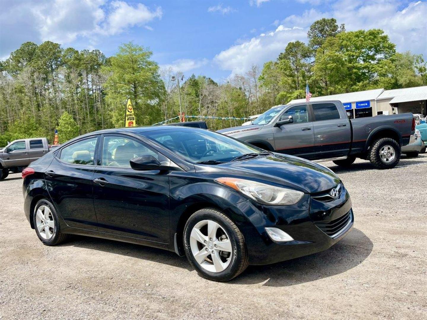 2013 Black /Tan Hyundai Elantra (KMHDH4AE8DU) with an 1.8l I-4 MPI Dohc 1.8l engine, Automatic transmission, located at 745 East Steele Rd., West Columbia, SC, 29170, (803) 755-9148, 33.927212, -81.148483 - Special Internet Price! 2013 Hyundai Elantra with Bluetooth, AM/FM/XM stereo, Remote keyless entry system, Cruise control, Cloth front bucket seats, Rear 60/40 split fold-down seat, Powered windows, Powered door locks, Plus more! - Photo#3