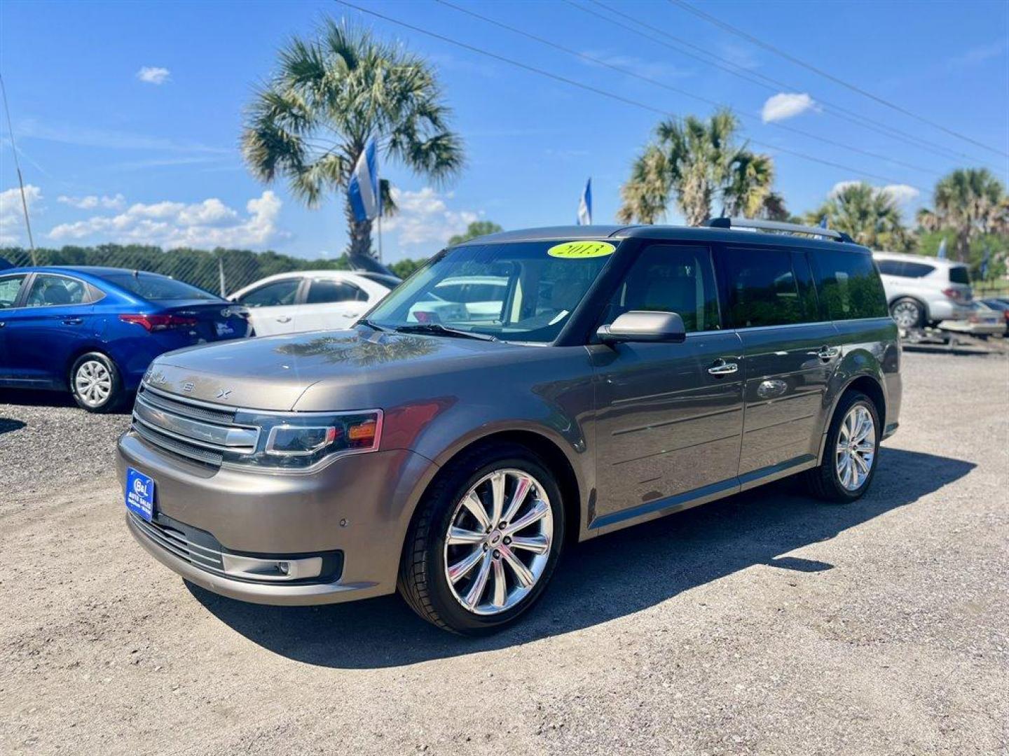 2013 Brown /Tan Ford Flex (2FMHK6DT8DB) with an 3.5l V6 DI T/C Ecoboost 3 engine, Automatic transmission, located at 745 East Steele Rd., West Columbia, SC, 29170, (803) 755-9148, 33.927212, -81.148483 - Special Internet Price! 2013 Ford Flex Limited with Bluetooth, Backup camera, Navigation, Cruise control, Air conditioning, Powered front seats, Leather interior, 3rd row seating, 2nd row rear entertainment, Powered windows, Powered door locks, Plus more! - Photo#0