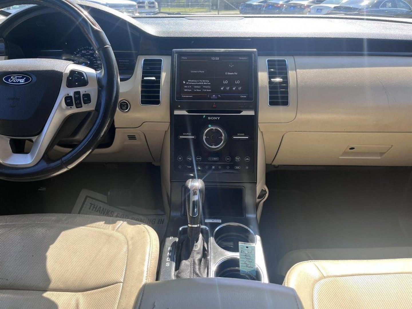 2013 Brown /Tan Ford Flex (2FMHK6DT8DB) with an 3.5l V6 DI T/C Ecoboost 3 engine, Automatic transmission, located at 745 East Steele Rd., West Columbia, SC, 29170, (803) 755-9148, 33.927212, -81.148483 - Special Internet Price! 2013 Ford Flex Limited with Bluetooth, Backup camera, Navigation, Cruise control, Air conditioning, Powered front seats, Leather interior, 3rd row seating, 2nd row rear entertainment, Powered windows, Powered door locks, Plus more! - Photo#9