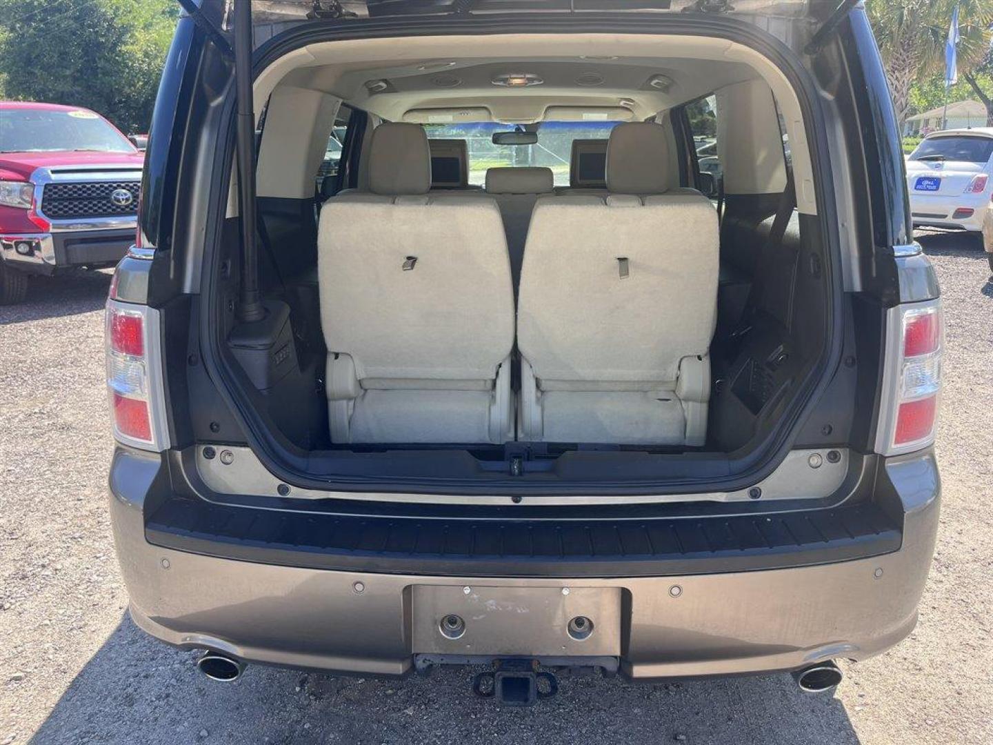 2013 Brown /Tan Ford Flex (2FMHK6DT8DB) with an 3.5l V6 DI T/C Ecoboost 3 engine, Automatic transmission, located at 745 East Steele Rd., West Columbia, SC, 29170, (803) 755-9148, 33.927212, -81.148483 - Special Internet Price! 2013 Ford Flex Limited with Bluetooth, Backup camera, Navigation, Cruise control, Air conditioning, Powered front seats, Leather interior, 3rd row seating, 2nd row rear entertainment, Powered windows, Powered door locks, Plus more! - Photo#33