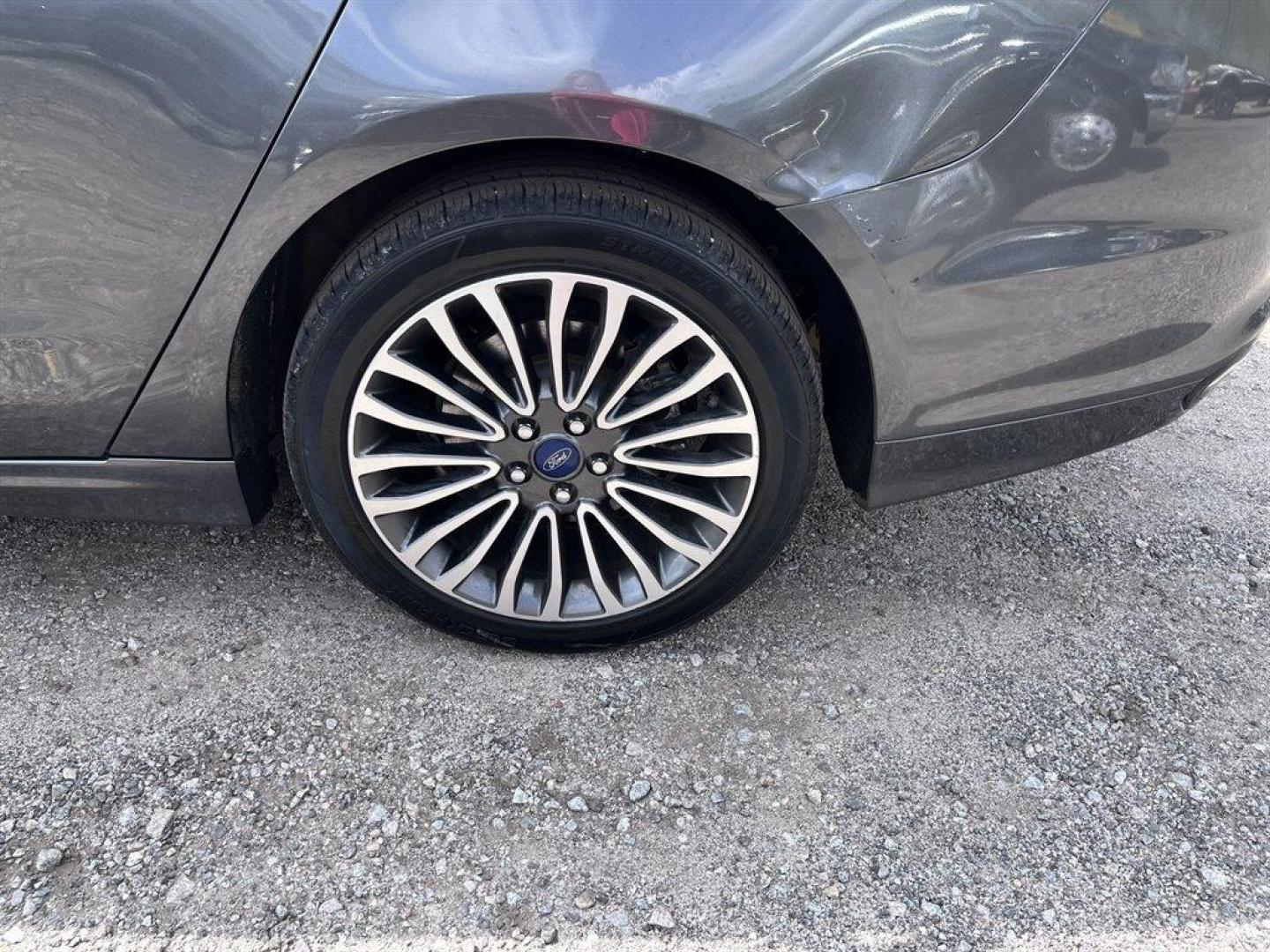 2018 Grey /Black Ford Fusion (3FA6P0D95JR) with an 2.0l I-4 DI T/C Ecoboost engine, Automatic transmission, located at 745 East Steele Rd., West Columbia, SC, 29170, (803) 755-9148, 33.927212, -81.148483 - Special Internet Price! 2018 Ford Fusion with Bluetooth, AM/FM Stereo, Sunroof, Backup camera, Cruise control, Keyless entry, Leather interior, Powered front seats, Powered windows, Powered door locks, Plus more! - Photo#36