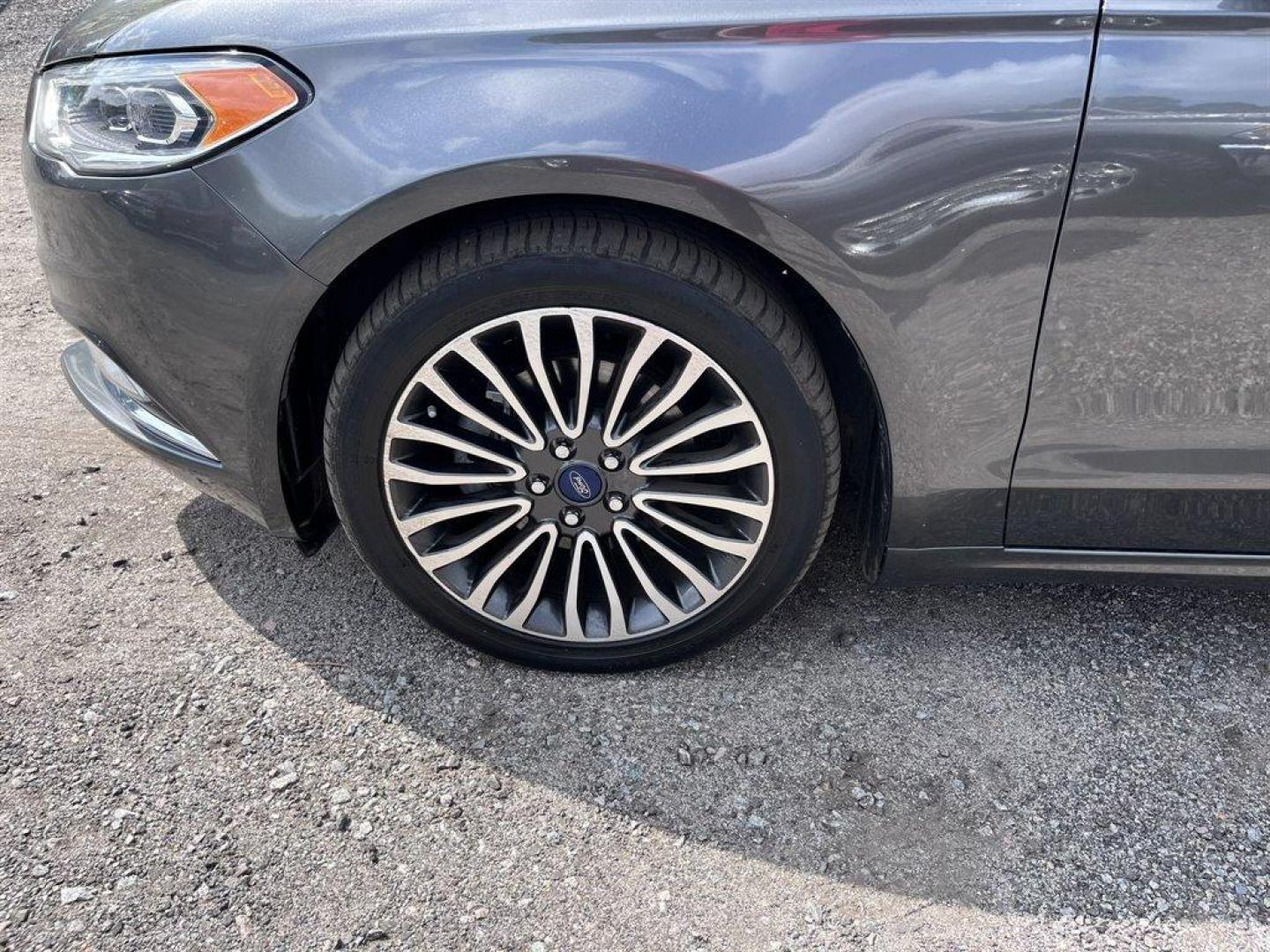 2018 Grey /Black Ford Fusion (3FA6P0D95JR) with an 2.0l I-4 DI T/C Ecoboost engine, Automatic transmission, located at 745 East Steele Rd., West Columbia, SC, 29170, (803) 755-9148, 33.927212, -81.148483 - Special Internet Price! 2018 Ford Fusion with Bluetooth, AM/FM Stereo, Sunroof, Backup camera, Cruise control, Keyless entry, Leather interior, Powered front seats, Powered windows, Powered door locks, Plus more! - Photo#37