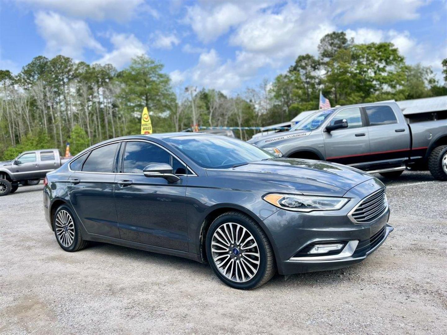 2018 Grey /Black Ford Fusion (3FA6P0D95JR) with an 2.0l I-4 DI T/C Ecoboost engine, Automatic transmission, located at 745 East Steele Rd., West Columbia, SC, 29170, (803) 755-9148, 33.927212, -81.148483 - Special Internet Price! 2018 Ford Fusion with Bluetooth, AM/FM Stereo, Sunroof, Backup camera, Cruise control, Keyless entry, Leather interior, Powered front seats, Powered windows, Powered door locks, Plus more! - Photo#3