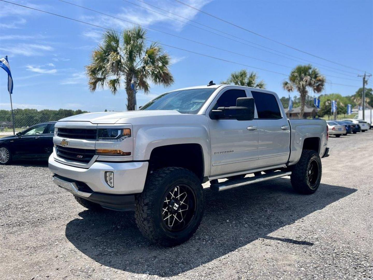 2018 Silver /Black Chevrolet Silverado 1500 (3GCUKREC9J5) with an 5.3l V8 DI VVT Flex 5.3l engine, Automatic transmission, located at 745 East Steele Rd., West Columbia, SC, 29170, (803) 755-9148, 33.927212, -81.148483 - Special Internet Price! 2018 Chevrolet Silverado 1500 LT Z71 with Chevrolet MyLink Radio with 8 diagonal color touch-screen, AM/FM stereo, Backup camera, Navigation, Cruise control, Air conditioning, Remote keyless entry, Cloth interior, Rear 60/40 folding bench, Powered windows, Powered door locks, - Photo#0