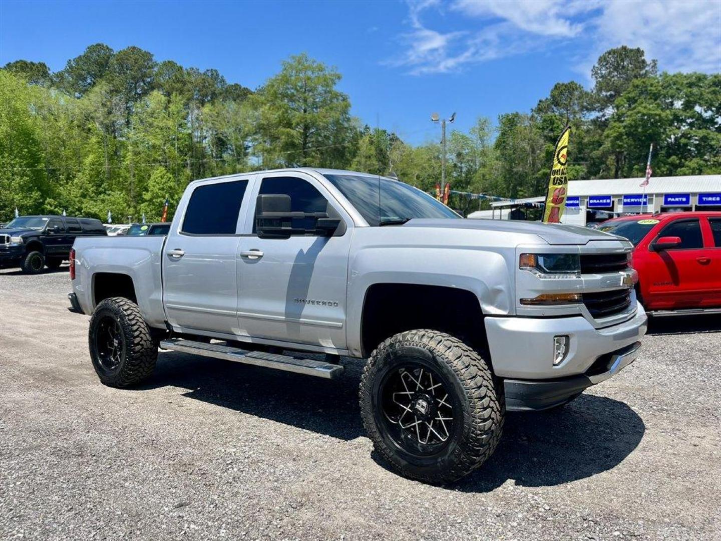 2018 Silver /Black Chevrolet Silverado 1500 (3GCUKREC9J5) with an 5.3l V8 DI VVT Flex 5.3l engine, Automatic transmission, located at 745 East Steele Rd., West Columbia, SC, 29170, (803) 755-9148, 33.927212, -81.148483 - Special Internet Price! 2018 Chevrolet Silverado 1500 LT Z71 with Chevrolet MyLink Radio with 8 diagonal color touch-screen, AM/FM stereo, Backup camera, Navigation, Cruise control, Air conditioning, Remote keyless entry, Cloth interior, Rear 60/40 folding bench, Powered windows, Powered door locks, - Photo#3