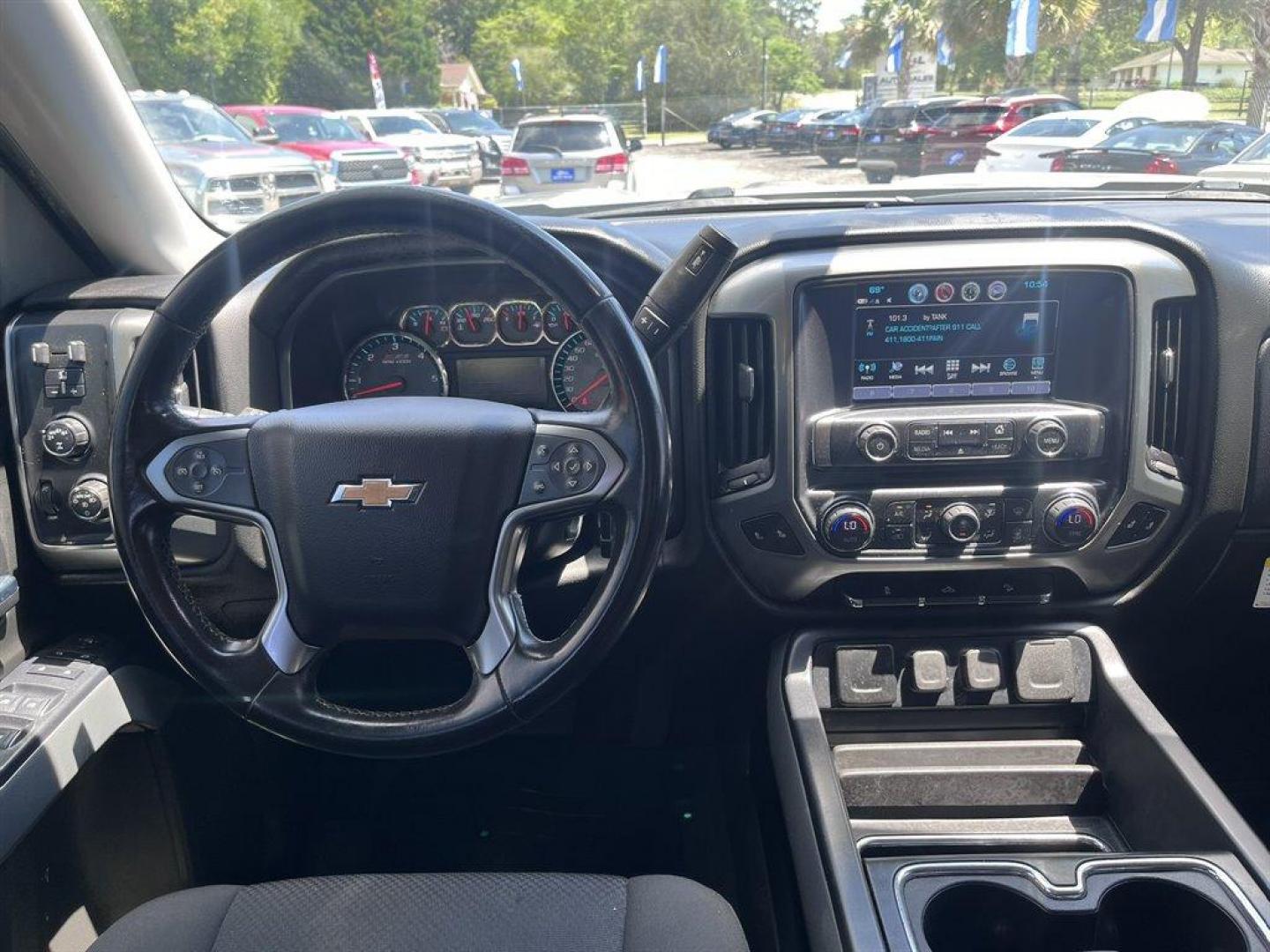 2018 Silver /Black Chevrolet Silverado 1500 (3GCUKREC9J5) with an 5.3l V8 DI VVT Flex 5.3l engine, Automatic transmission, located at 745 East Steele Rd., West Columbia, SC, 29170, (803) 755-9148, 33.927212, -81.148483 - Special Internet Price! 2018 Chevrolet Silverado 1500 LT Z71 with Chevrolet MyLink Radio with 8 diagonal color touch-screen, AM/FM stereo, Backup camera, Navigation, Cruise control, Air conditioning, Remote keyless entry, Cloth interior, Rear 60/40 folding bench, Powered windows, Powered door locks, - Photo#5