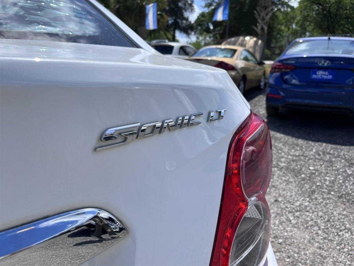 2016 White /Grey Chevrolet Sonic (1G1JC5SH4G4) with an 1.8l I-4 MFI Dohc Flex 1. engine, Automatic transmission, located at 745 East Steele Rd., West Columbia, SC, 29170, (803) 755-9148, 33.927212, -81.148483 - Special Internet Price! 2016 Chevrolet Sonic LT with Chevrolet MyLink radio, AM/FM stereo, Cruise control, Air conditioning, Front bucket seats, Rear bench 60/40 seat, Powered windows, Powered door locks, Plus more! - Photo#24