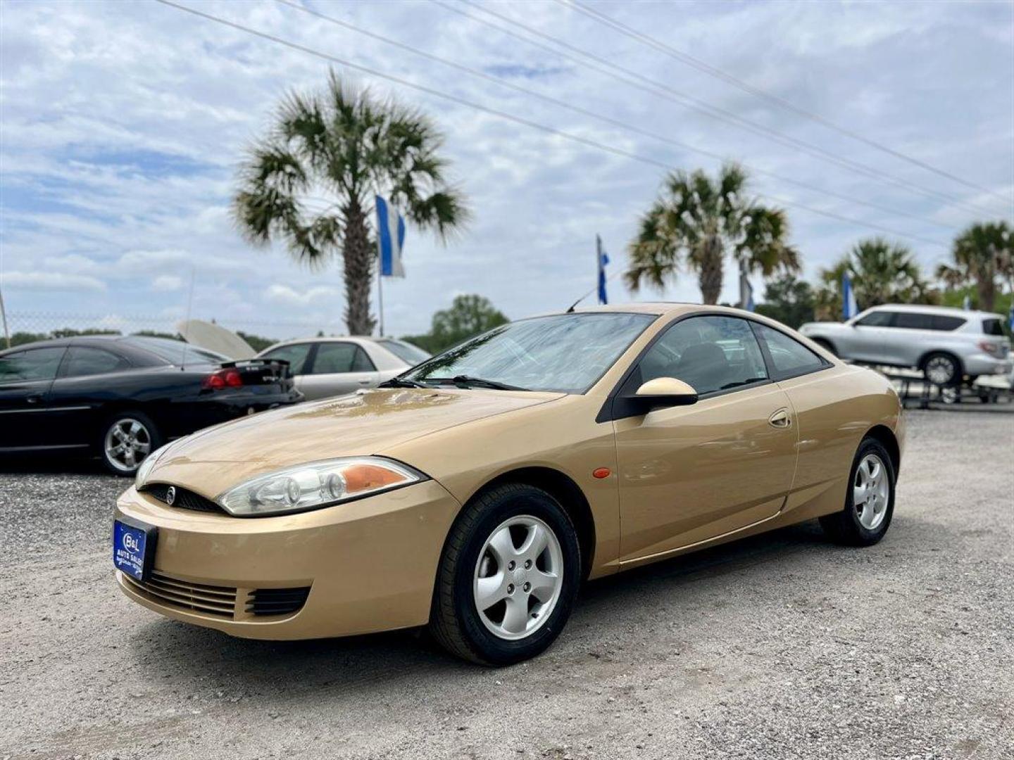 2001 Gold /Grey Mercury Cougar (1ZWFT61L915) with an 2.5l V6 EFI Dohc 2.5l engine, Automatic transmission, located at 745 East Steele Rd., West Columbia, SC, 29170, (803) 755-9148, 33.927212, -81.148483 - Special Internet Price! 2001 Mercury Cougar with AM/FM radio, Cruise control, Cloth interior, Front bucket seats, 50/50 split folding rear seats, Powered windows, Powered door locks, Plus more! - Photo#0