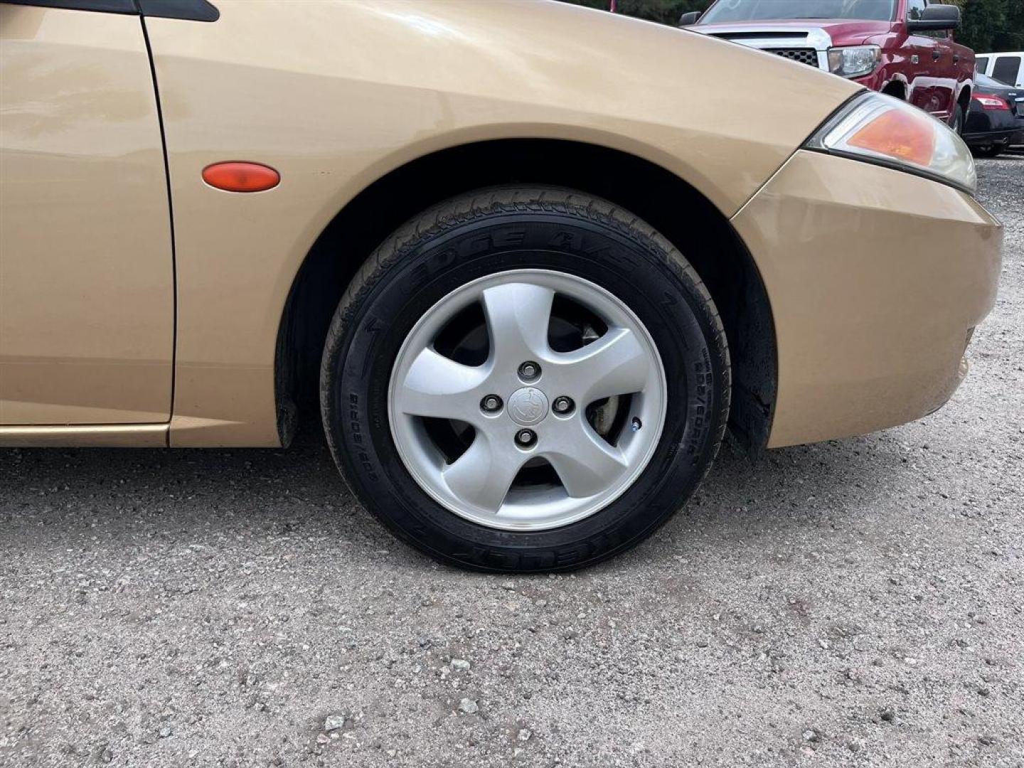 2001 Gold /Grey Mercury Cougar (1ZWFT61L915) with an 2.5l V6 EFI Dohc 2.5l engine, Automatic transmission, located at 745 East Steele Rd., West Columbia, SC, 29170, (803) 755-9148, 33.927212, -81.148483 - Special Internet Price! 2001 Mercury Cougar with AM/FM radio, Cruise control, Cloth interior, Front bucket seats, 50/50 split folding rear seats, Powered windows, Powered door locks, Plus more! - Photo#23