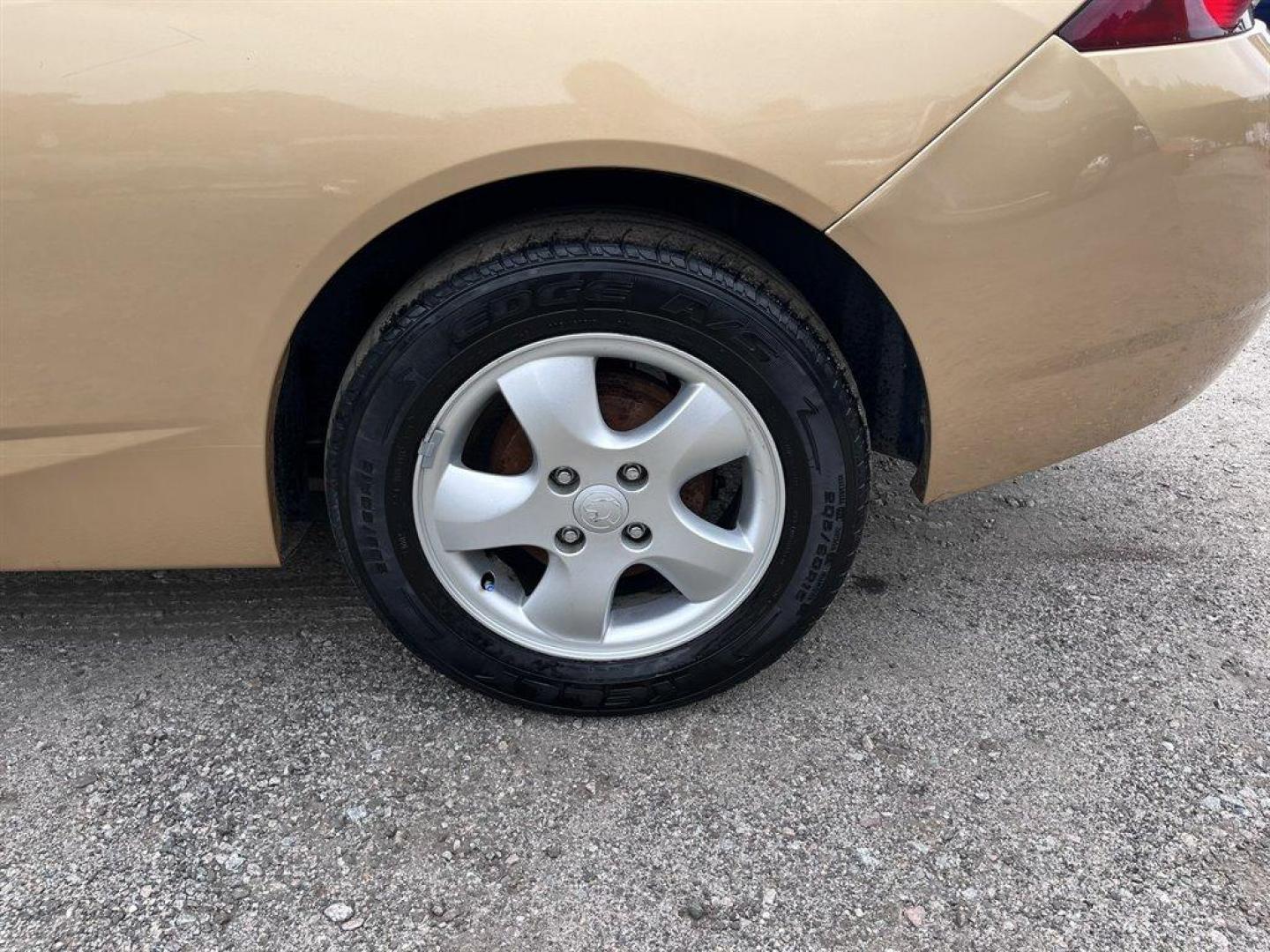 2001 Gold /Grey Mercury Cougar (1ZWFT61L915) with an 2.5l V6 EFI Dohc 2.5l engine, Automatic transmission, located at 745 East Steele Rd., West Columbia, SC, 29170, (803) 755-9148, 33.927212, -81.148483 - Special Internet Price! 2001 Mercury Cougar with AM/FM radio, Cruise control, Cloth interior, Front bucket seats, 50/50 split folding rear seats, Powered windows, Powered door locks, Plus more! - Photo#25