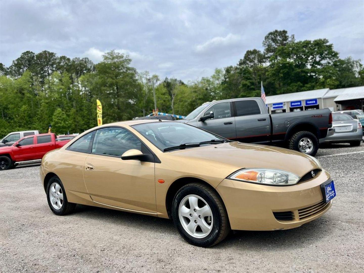 2001 Gold /Grey Mercury Cougar (1ZWFT61L915) with an 2.5l V6 EFI Dohc 2.5l engine, Automatic transmission, located at 745 East Steele Rd., West Columbia, SC, 29170, (803) 755-9148, 33.927212, -81.148483 - Special Internet Price! 2001 Mercury Cougar with AM/FM radio, Cruise control, Cloth interior, Front bucket seats, 50/50 split folding rear seats, Powered windows, Powered door locks, Plus more! - Photo#3