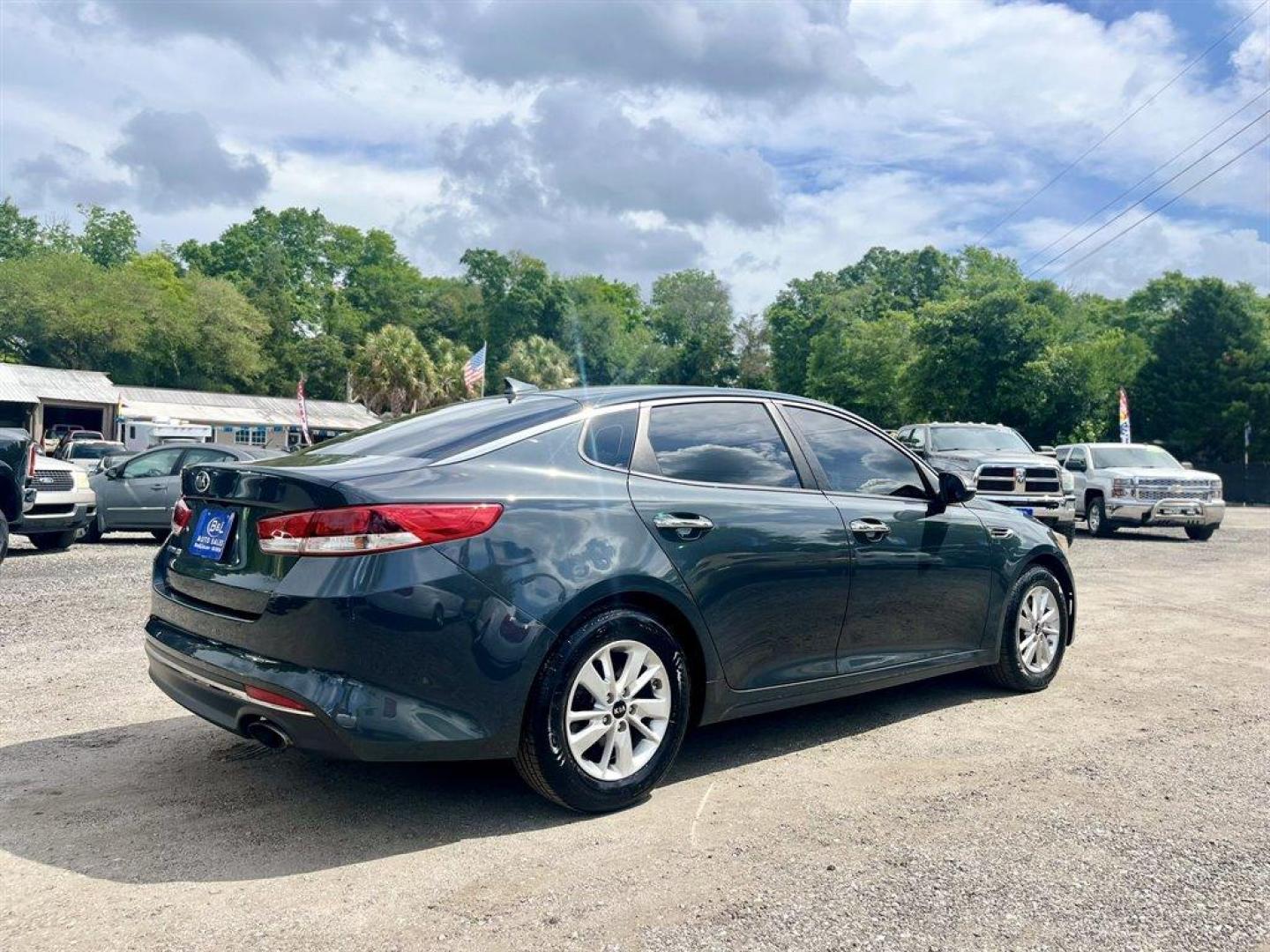 2016 Grey /Grey Kia Optima (KNAGT4L39G5) with an 2.4l I-4 DI Dohc 2.4l engine, Automatic transmission, located at 745 East Steele Rd., West Columbia, SC, 29170, (803) 755-9148, 33.927212, -81.148483 - Special Internet Price! 2016 Kia Optima LX With Bluetooth, AM/FM/CD/MP3, Remote Keyless Entry, Manual Air Conditioning, Front Bucket Seats, Rear 60-40 Folding Bench, Powered Windows, Powered Door Locks, Plus More! - Photo#2