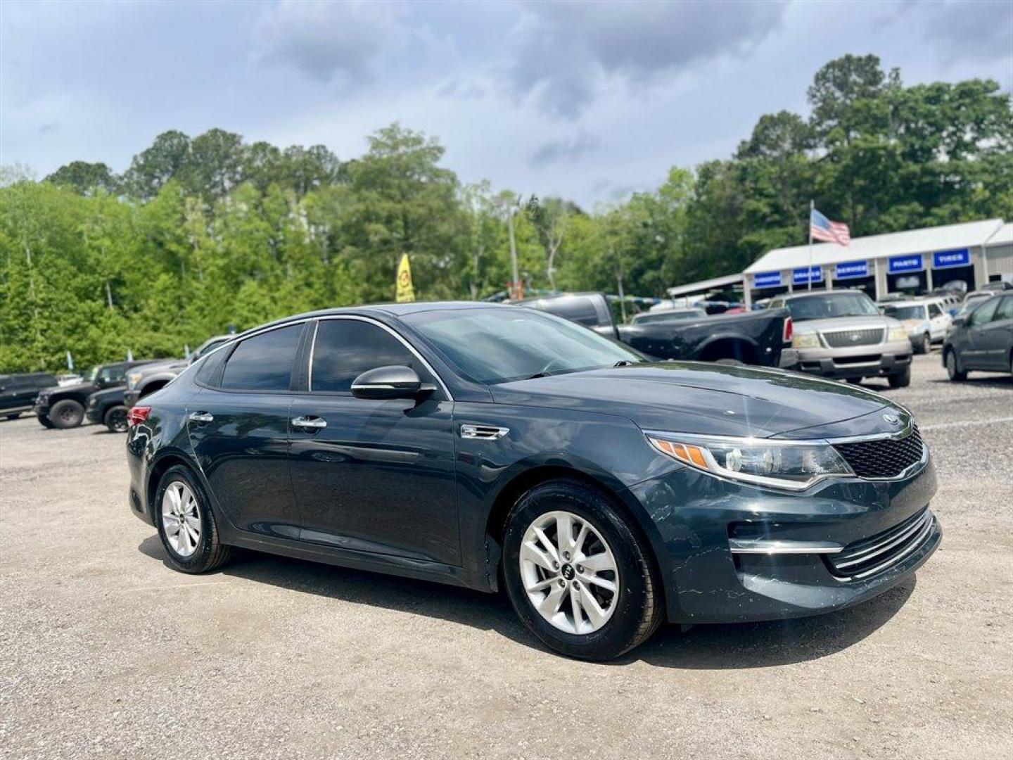 2016 Grey /Grey Kia Optima (KNAGT4L39G5) with an 2.4l I-4 DI Dohc 2.4l engine, Automatic transmission, located at 745 East Steele Rd., West Columbia, SC, 29170, (803) 755-9148, 33.927212, -81.148483 - Special Internet Price! 2016 Kia Optima LX With Bluetooth, AM/FM/CD/MP3, Remote Keyless Entry, Manual Air Conditioning, Front Bucket Seats, Rear 60-40 Folding Bench, Powered Windows, Powered Door Locks, Plus More! - Photo#3