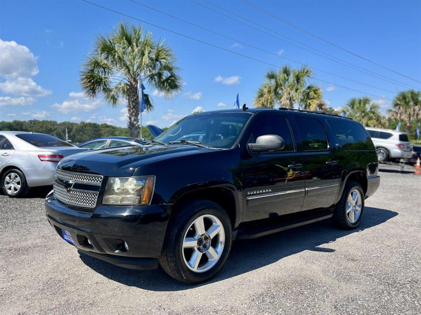 2014 Black /Black Chevrolet Suburban (1GNSKKE71ER) with an 5.3l V8 SFI Flex 5.3l engine, Automatic transmission, located at 745 East Steele Rd., West Columbia, SC, 29170, (803) 755-9148, 33.927212, -81.148483 - Special Internet Price! 2014 Chevrolet Suburban 1500 LTZ with Bluetooth, AM/FM radio, Backup camera, Navigation, Cruise control, Keyless entry, Sunroof, Leather interior, 3rd row seating, Powered driver seat, Duel rear entertainment, Powered liftgate, Powered windows, Powered door locks, Plus more! - Photo#0