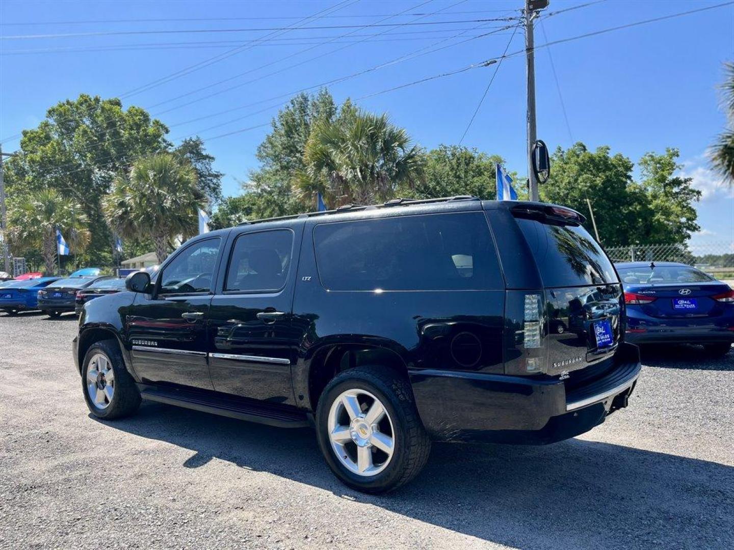 2014 Black /Black Chevrolet Suburban (1GNSKKE71ER) with an 5.3l V8 SFI Flex 5.3l engine, Automatic transmission, located at 745 East Steele Rd., West Columbia, SC, 29170, (803) 755-9148, 33.927212, -81.148483 - Special Internet Price! 2014 Chevrolet Suburban 1500 LTZ with Bluetooth, AM/FM radio, Backup camera, Navigation, Cruise control, Keyless entry, Sunroof, Leather interior, 3rd row seating, Powered driver seat, Duel rear entertainment, Powered liftgate, Powered windows, Powered door locks, Plus more! - Photo#1