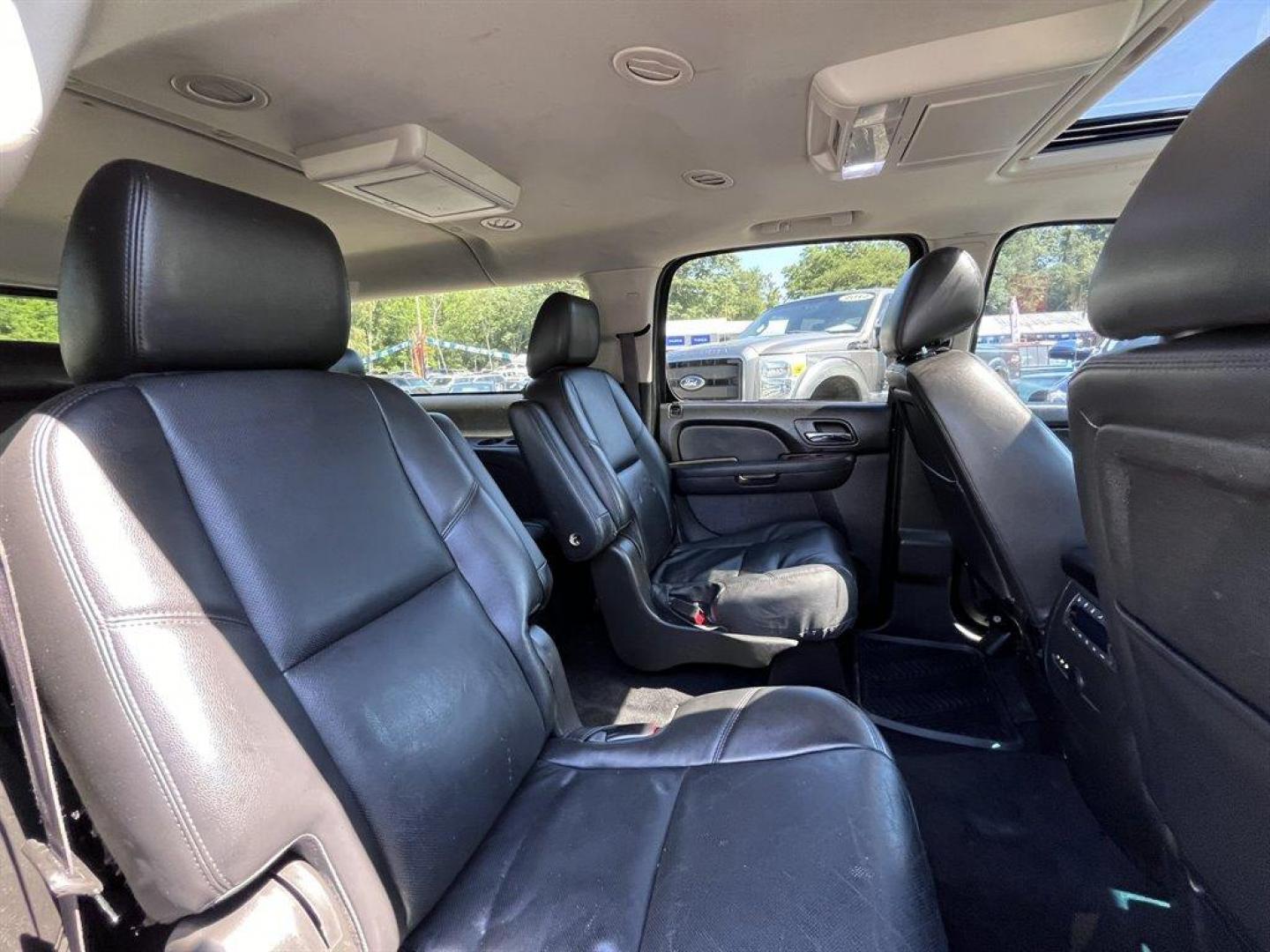 2014 Black /Black Chevrolet Suburban (1GNSKKE71ER) with an 5.3l V8 SFI Flex 5.3l engine, Automatic transmission, located at 745 East Steele Rd., West Columbia, SC, 29170, (803) 755-9148, 33.927212, -81.148483 - Special Internet Price! 2014 Chevrolet Suburban 1500 LTZ with Bluetooth, AM/FM radio, Backup camera, Navigation, Cruise control, Keyless entry, Sunroof, Leather interior, 3rd row seating, Powered driver seat, Duel rear entertainment, Powered liftgate, Powered windows, Powered door locks, Plus more! - Photo#29