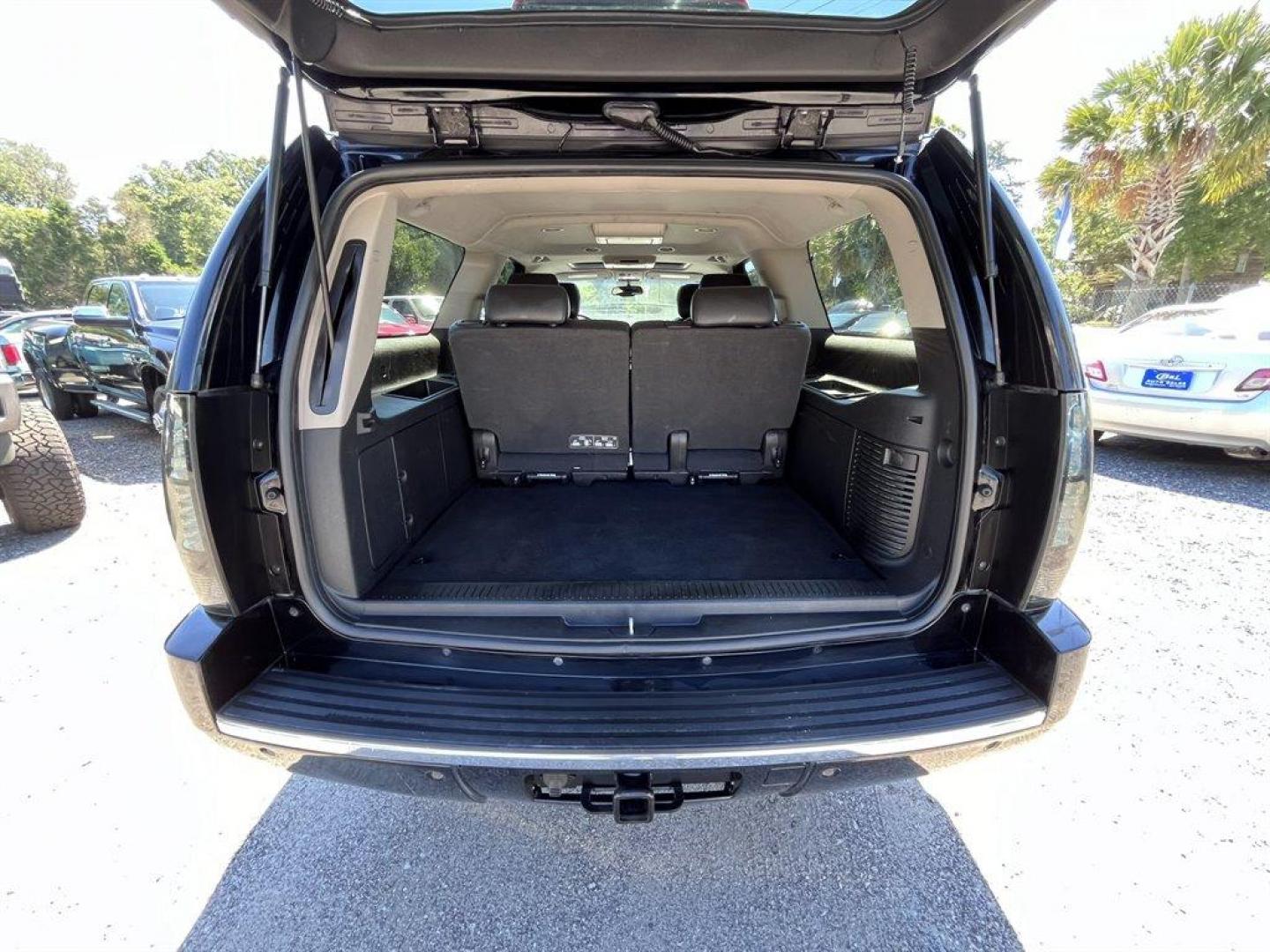 2014 Black /Black Chevrolet Suburban (1GNSKKE71ER) with an 5.3l V8 SFI Flex 5.3l engine, Automatic transmission, located at 745 East Steele Rd., West Columbia, SC, 29170, (803) 755-9148, 33.927212, -81.148483 - Special Internet Price! 2014 Chevrolet Suburban 1500 LTZ with Bluetooth, AM/FM radio, Backup camera, Navigation, Cruise control, Keyless entry, Sunroof, Leather interior, 3rd row seating, Powered driver seat, Duel rear entertainment, Powered liftgate, Powered windows, Powered door locks, Plus more! - Photo#34