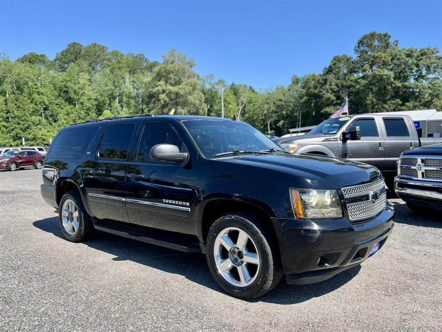 2014 Black /Black Chevrolet Suburban (1GNSKKE71ER) with an 5.3l V8 SFI Flex 5.3l engine, Automatic transmission, located at 745 East Steele Rd., West Columbia, SC, 29170, (803) 755-9148, 33.927212, -81.148483 - Special Internet Price! 2014 Chevrolet Suburban 1500 LTZ with Bluetooth, AM/FM radio, Backup camera, Navigation, Cruise control, Keyless entry, Sunroof, Leather interior, 3rd row seating, Powered driver seat, Duel rear entertainment, Powered liftgate, Powered windows, Powered door locks, Plus more! - Photo#3