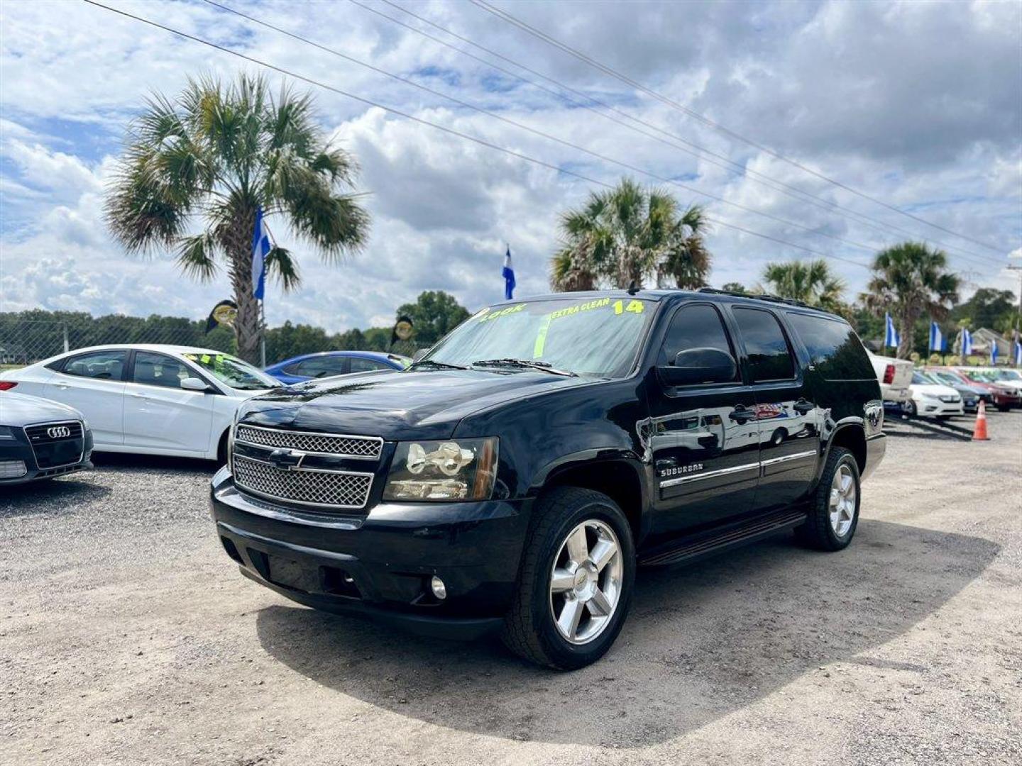 2014 Black /Black Chevrolet Suburban (1GNSKKE71ER) with an 5.3l V8 SFI Flex 5.3l engine, Automatic transmission, located at 745 East Steele Rd., West Columbia, SC, 29170, (803) 755-9148, 33.927212, -81.148483 - Special Internet Price! 2014 Chevrolet Suburban with AM/FM/SiriusXM stereo, Bluetooth for phone, Bose Centerpoint Surround Sound 10-speaker system, Backup camera, Navigation, Cruise control, Leather interior, Third row seating, Rear entertainment, Tri-zone air conditioning, Sunroof, Powered windows, - Photo#0