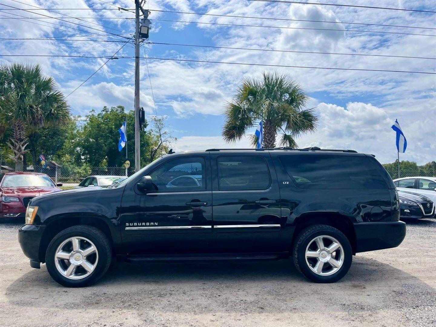 2014 Black /Black Chevrolet Suburban (1GNSKKE71ER) with an 5.3l V8 SFI Flex 5.3l engine, Automatic transmission, located at 745 East Steele Rd., West Columbia, SC, 29170, (803) 755-9148, 33.927212, -81.148483 - Special Internet Price! 2014 Chevrolet Suburban with AM/FM/SiriusXM stereo, Bluetooth for phone, Bose Centerpoint Surround Sound 10-speaker system, Backup camera, Navigation, Cruise control, Leather interior, Third row seating, Rear entertainment, Tri-zone air conditioning, Sunroof, Powered windows, - Photo#1