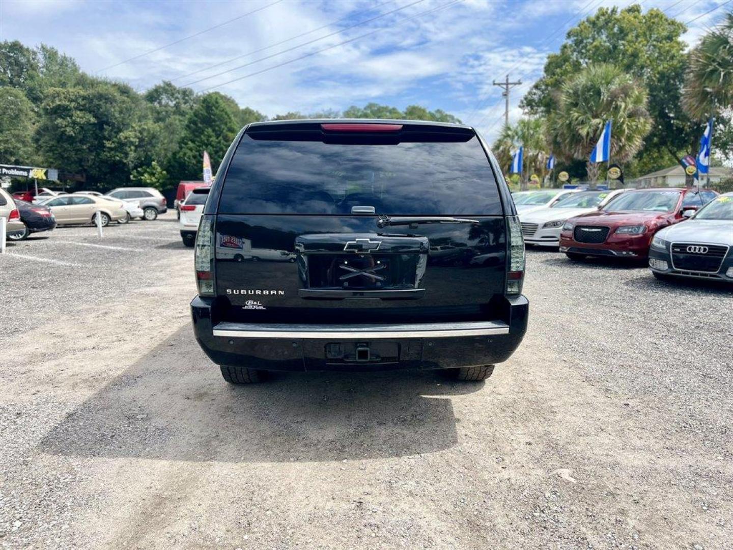 2014 Black /Black Chevrolet Suburban (1GNSKKE71ER) with an 5.3l V8 SFI Flex 5.3l engine, Automatic transmission, located at 745 East Steele Rd., West Columbia, SC, 29170, (803) 755-9148, 33.927212, -81.148483 - Special Internet Price! 2014 Chevrolet Suburban with AM/FM/SiriusXM stereo, Bluetooth for phone, Bose Centerpoint Surround Sound 10-speaker system, Backup camera, Navigation, Cruise control, Leather interior, Third row seating, Rear entertainment, Tri-zone air conditioning, Sunroof, Powered windows, - Photo#3