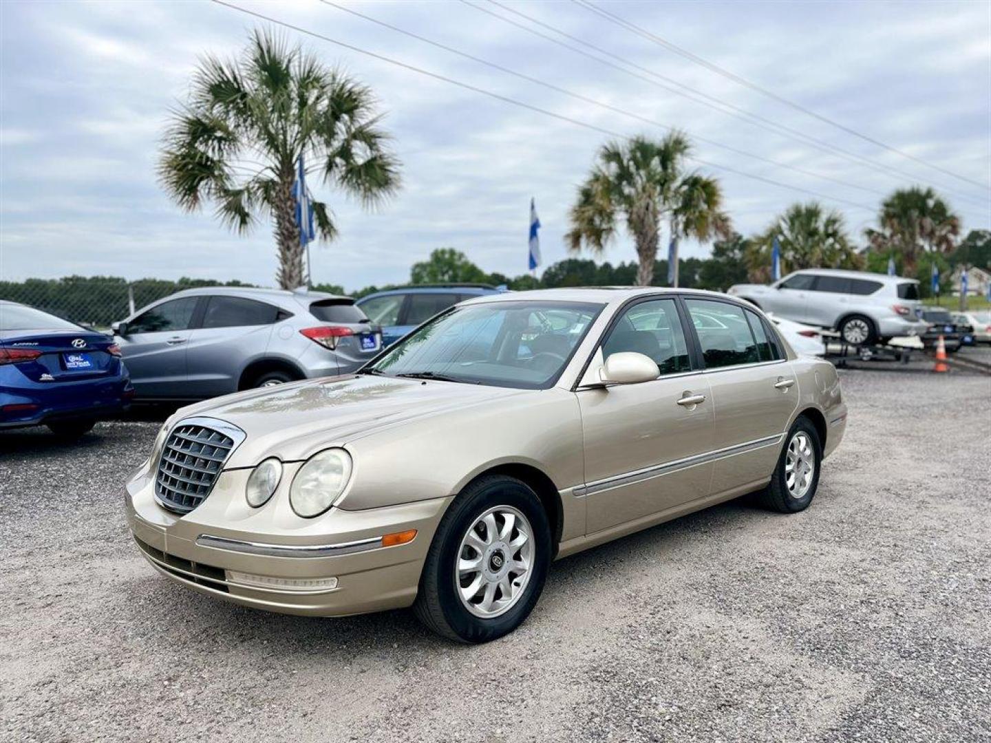 2004 Gold /Black Kia Amanti (KNALD124745) with an 3.5l V6 MPI Dohc 3.5l engine, Automatic transmission, located at 745 East Steele Rd., West Columbia, SC, 29170, (803) 755-9148, 33.927212, -81.148483 - Special Internet Price! 2004 Kia Amanti with AM/FM radio, Cruise control, Sunroof, Leather interior, Keyless entry, Powered driver seat, Fixed rear bench seat, Powered windows, Powered door locks, Plus more! - Photo#0