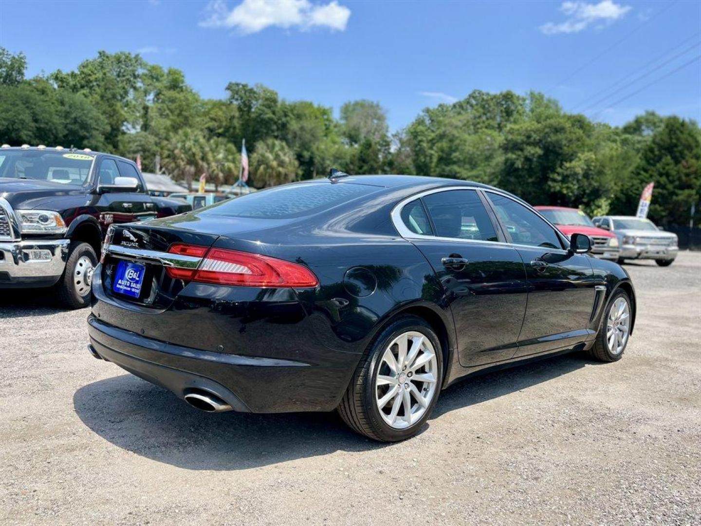 2015 Black /Black Jaguar XF (SAJWA0FS4FP) with an 2.0l I-4 EFI Dohc 2.0l engine, Automatic transmission, located at 745 East Steele Rd., West Columbia, SC, 29170, (803) 755-9148, 33.927212, -81.148483 - Special Internet Price! 2015 Jaguar XF 2.0t Premium with Bluetooth, AM/FM radio, Cruise control, Backup camera, Navigation, Sunroof, Leather interior, Powered front seats, Powered windows, Powered door locks, Plus more! - Photo#2