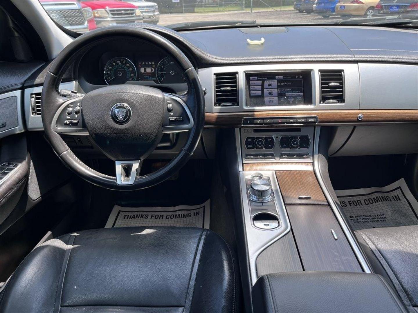 2015 Black /Black Jaguar XF (SAJWA0FS4FP) with an 2.0l I-4 EFI Dohc 2.0l engine, Automatic transmission, located at 745 East Steele Rd., West Columbia, SC, 29170, (803) 755-9148, 33.927212, -81.148483 - Special Internet Price! 2015 Jaguar XF 2.0t Premium with Bluetooth, AM/FM radio, Cruise control, Backup camera, Navigation, Sunroof, Leather interior, Powered front seats, Powered windows, Powered door locks, Plus more! - Photo#4