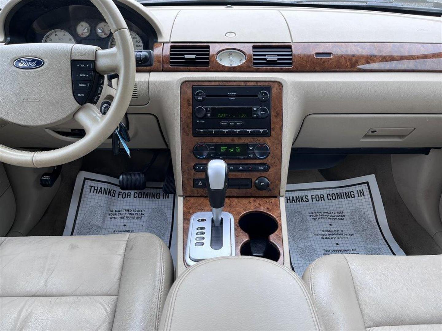 2005 Green /Tan Ford Five Hundred (1FAHP25175G) with an 3.0l V6 EFI 3.0l engine, Automatic transmission, located at 745 East Steele Rd., West Columbia, SC, 29170, (803) 755-9148, 33.927212, -81.148483 - Special Internet Price! 2005 Ford Five Hundred Limited with AM/FM stereo, Sunroof, Cruise control, Leather interior, Powered driver seat, Keyless entry keypad, Powered windows, Powered door locks, Plus more! - Photo#9