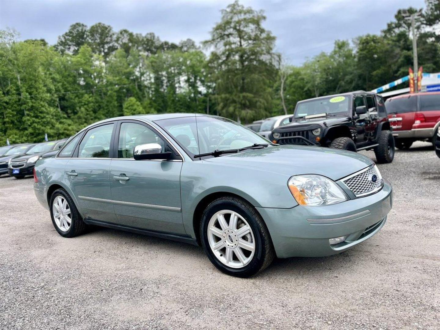 2005 Green /Tan Ford Five Hundred (1FAHP25175G) with an 3.0l V6 EFI 3.0l engine, Automatic transmission, located at 745 East Steele Rd., West Columbia, SC, 29170, (803) 755-9148, 33.927212, -81.148483 - Special Internet Price! 2005 Ford Five Hundred Limited with AM/FM stereo, Sunroof, Cruise control, Leather interior, Powered driver seat, Keyless entry keypad, Powered windows, Powered door locks, Plus more! - Photo#3